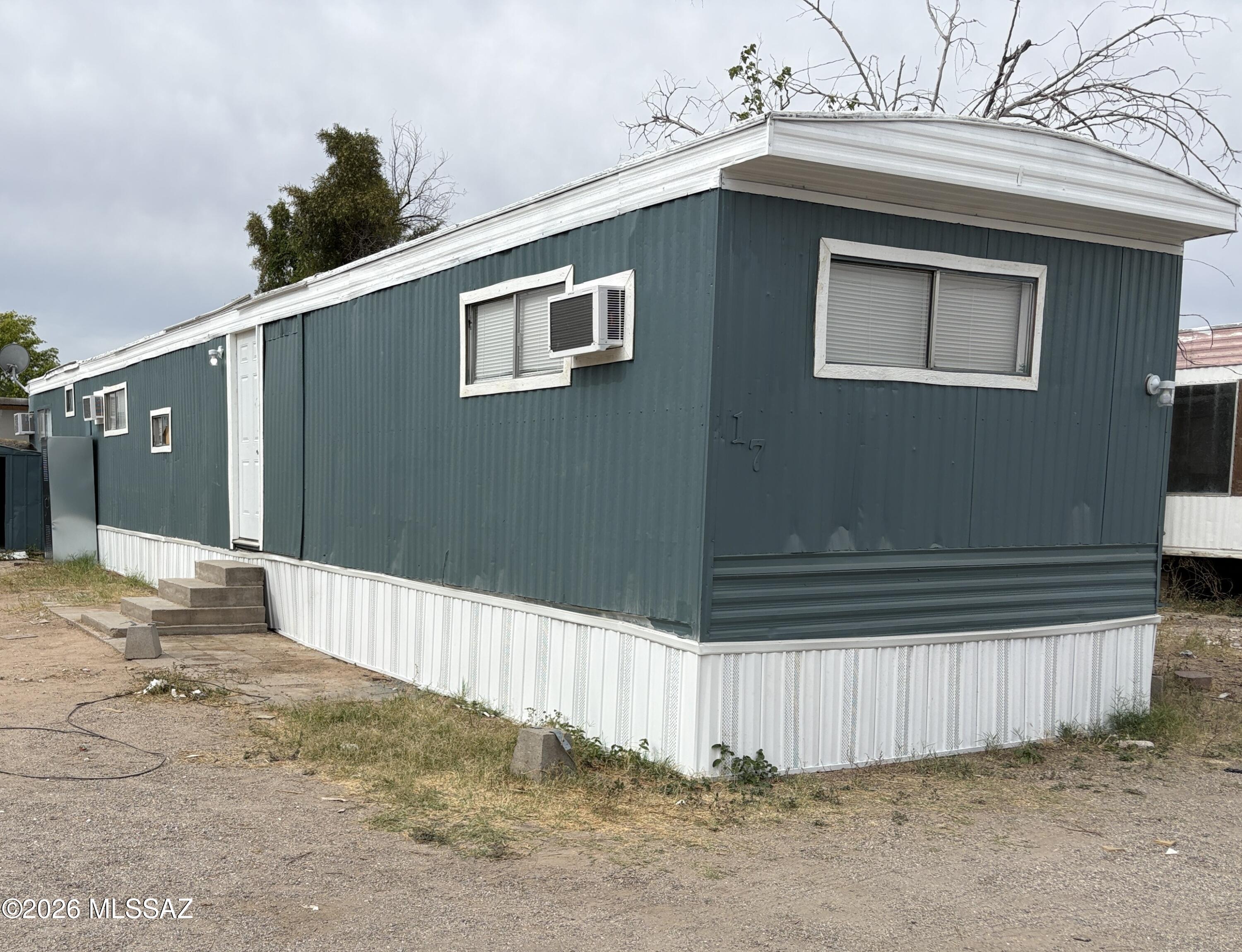 Renovated mobile home in  Desert Sun Mobile Home Park - 3 bedrooms - Family Park - $515/mo lot rent - buyer must qualify - Window ACs plus Mini Split - newer flooring, cabinets, fixtures,  nice unit