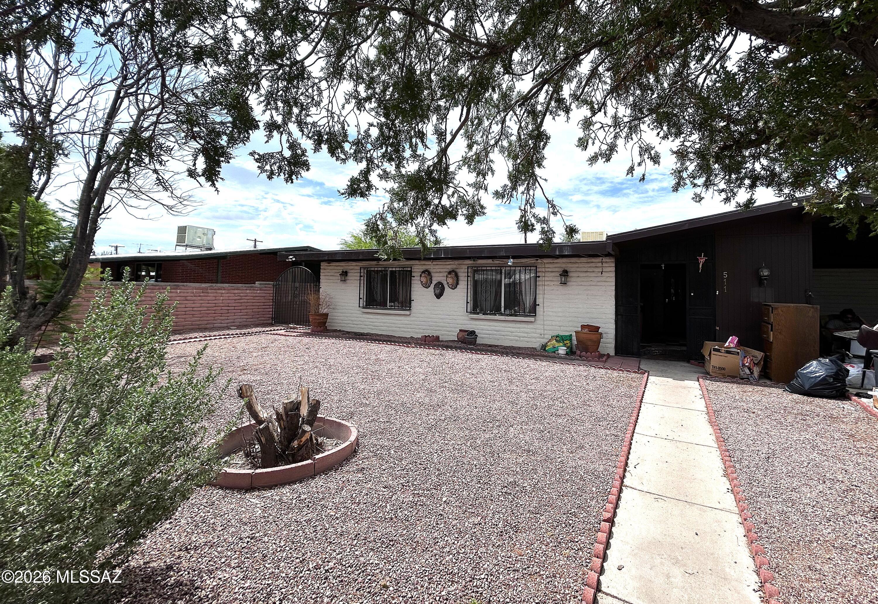 Welcome home to this spacious 4-bedroom, 2-bath residence in a convenient Tucson location. Enjoy easy access to I-19, shopping, restaurants, schools, and everyday amenities. The functional floor plan offers comfortable living spaces, generous bedrooms, and plenty of room for family, guests, or a home office. Don't miss this opportunity to own a great home in an established neighborhood!