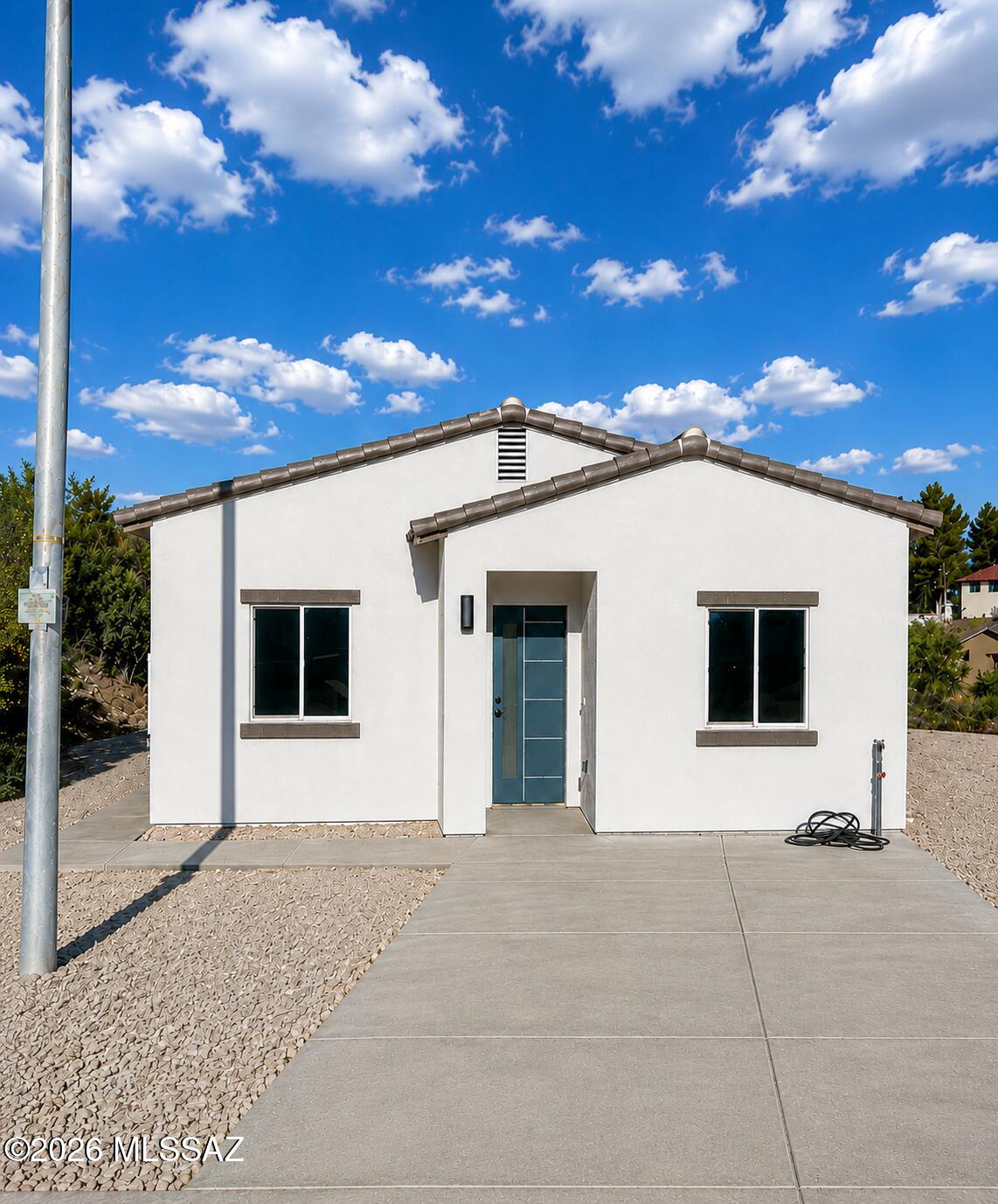 This home qualifies for USDA ZERO down payment program. Beautiful new construction home 3 beds, 2 baths, tile floors throughout the house, modern kitchen, open space, large lot with NO HOA, situated on a spacious lot in a quiet cul-de-sac. Enjoy stunning mountain and desert views in a peaceful setting while still being conveniently located with easy access to I-19 for commuting to Nogales or Tucson. A great opportunity to own a brand-new home in the growing Rio Rico community.