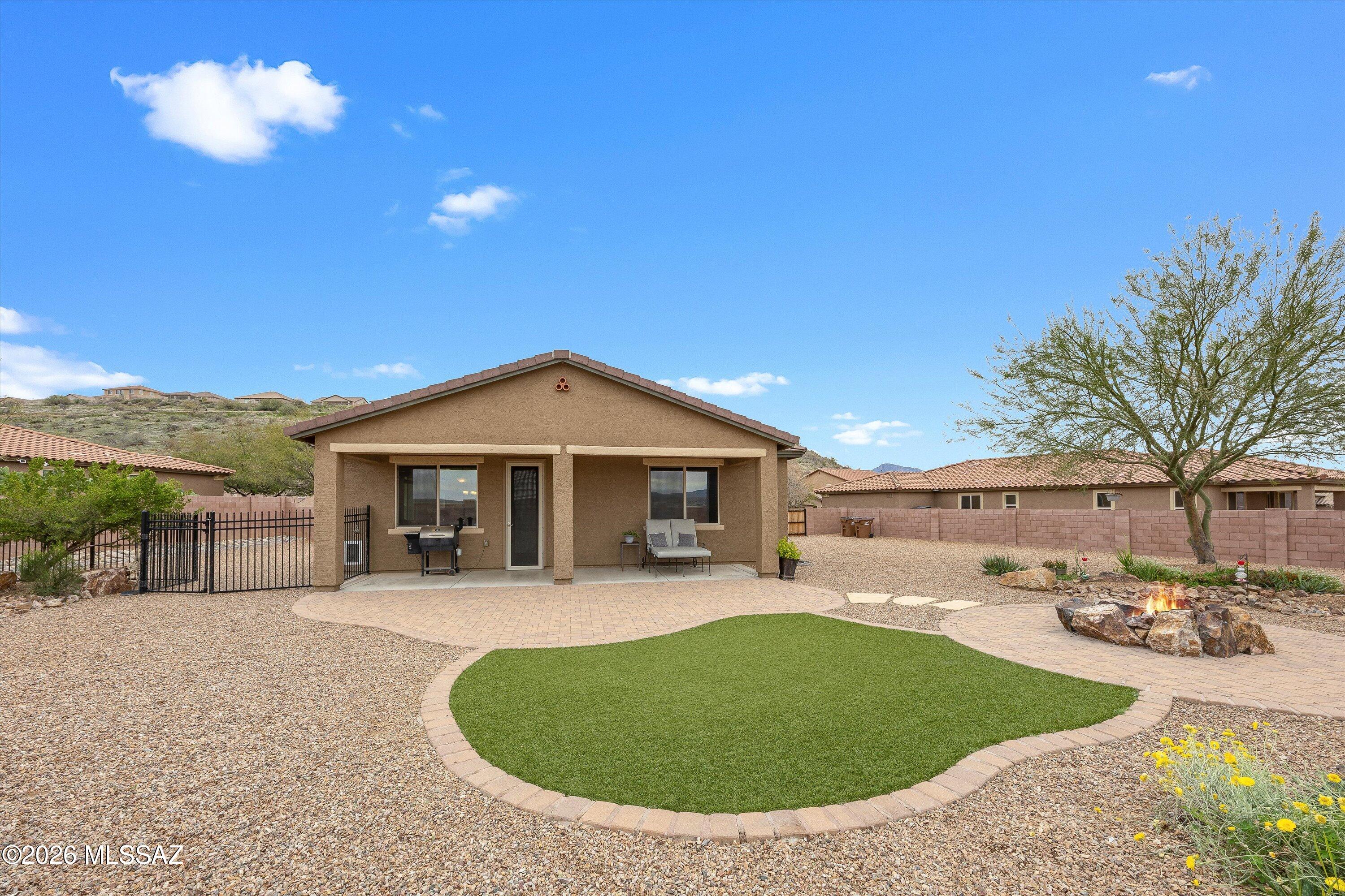 Welcome home to this stunning 3 bedroom, 2 bath residence with a versatile den, nestled in the desirable Eagle Crest Ranch community. Designed with comfort and functionality in mind, the open concept floor plan creates the perfect space for both everyday living and entertaining.
The spacious kitchen is truly the heart of the home, featuring beautiful granite countertops, abundant cabinet storage, generous counter space & a nice size pantry ideal for keeping everything organized and within reach.
Step outside to your beautifully landscaped backyard retreat, where breathtaking mountain views set the backdrop for Arizona living at its best. Enjoy cool desert evenings around the fire pit, while the separate dog run offers a secure and convenient space for pets.