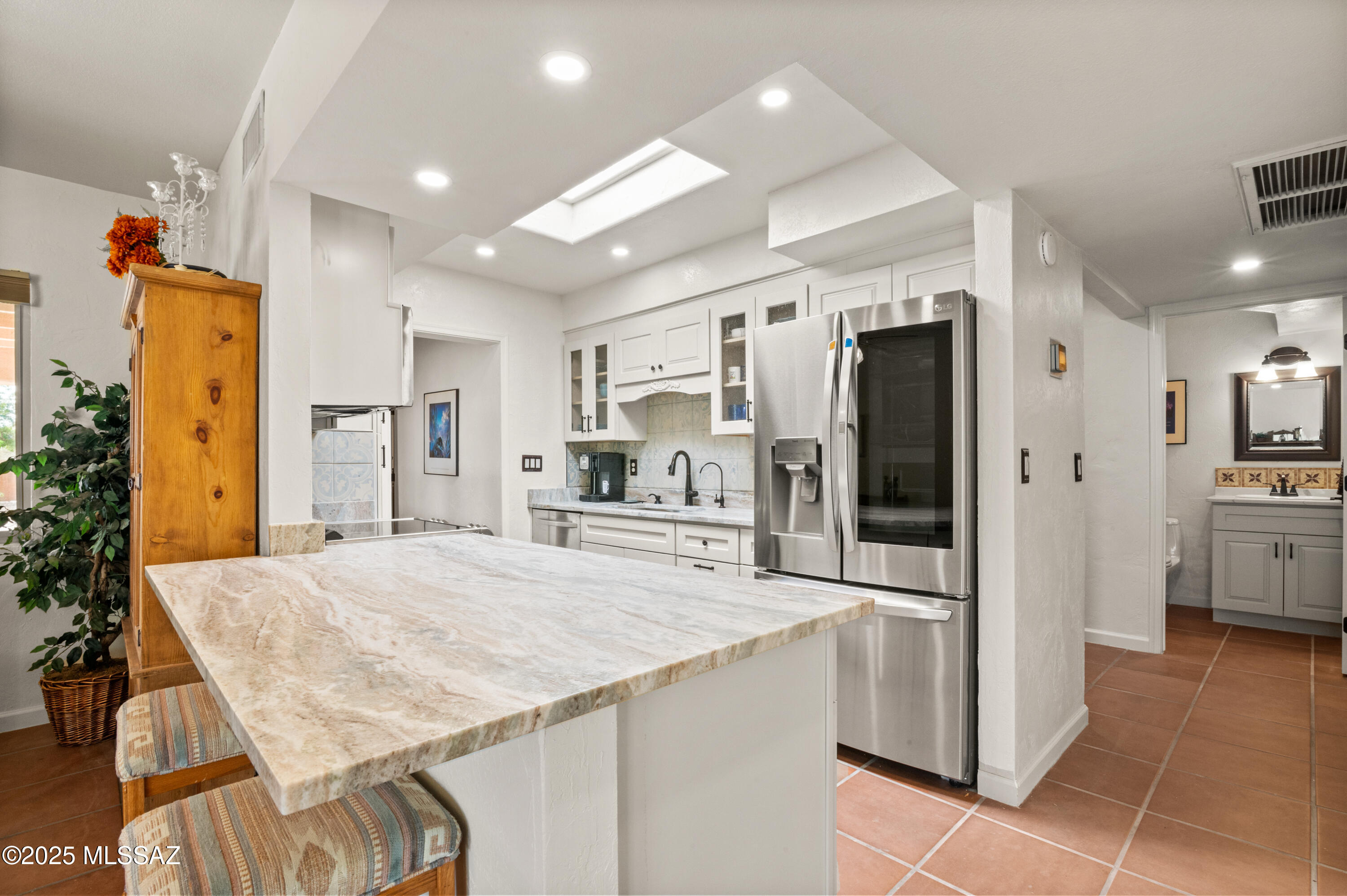 This beautiful home was professionally designed and remodeled. Nestled on a quiet cul-de-sac in Country Club Vista II, this huge .34 acre lot gives so many options.  A six foot stucco wall and new gates surround the back yard and small brick and turf patios have been created for great outdoor living.  A new Sunsetter awning was added to provide additional shade, and the many mature trees complete this great yard.  There's room for a pool, new patio. or just privacy. Has a wonderful Coleman hot tub that can stay or be removed at buyers request.  Additionally, there's a large storage room in the back that could be a workshop or a great place to keep bikes and toys. The home has a new kitchen with all new custom cabinetry, new appliances and sueded granite countertops and all the kitchenware you could need. The home is filled with natural light thanks to new low E windows, and you'll appreciate the solid wood interior doors throughout. The primary suite is a true retreat, featuring a separate office, workout, or craft room whatever suits your lifestyle! The primary bathroom is a spa-like haven, boasting dual sinks, Toto toilet, separate shower, and a luxurious free-standing soaking tub. A hallway library and mudroom connect to the private second bedroom with a hidden queen size Murphy bed and lots of bookcases- use it anyway you like! Cozy up by the recently cleaned wood-burning beehive fireplace on those cool winter nights. The owners have done all the hard work for you just move in and start enjoying your new home!
This is perfect for a winter retreat lock and go or full time residence. Fully furnished including housewares and linens. Or we will remove it all if you like and you can make it your own. All you need is your suitcase!