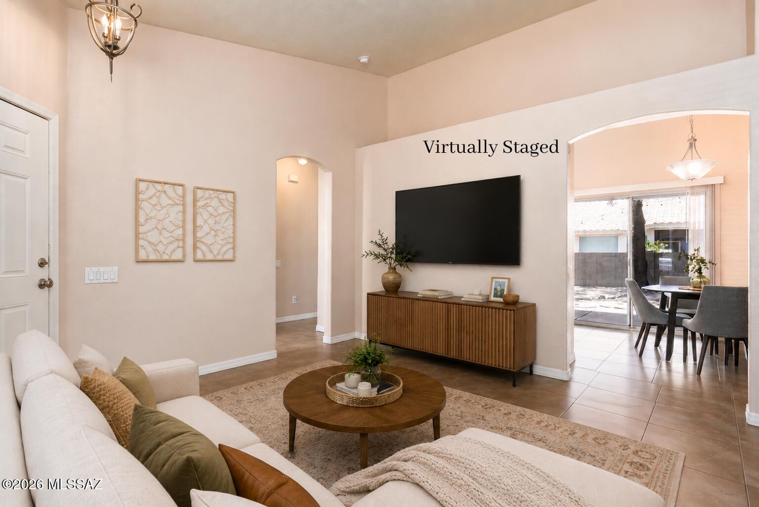 The house is move-in ready. The neighborhood is what makes it special.
Located in prestigious Continental Ranch, this home places you within minutes of the Continental Ranch Community Park with neighborhood amenities, including sports fields, playgrounds, basketball courts, tennis/pickleball courts, and you can't forget about the skate park! Inside the home, vaulted ceilings create a bright, open feel, while ceramic tile flooring throughout offers durability and easy maintenance, no carpet. Newer roof (2024) adds value and peace of mind, and the spacious backyard provides plenty of room to relax or create your ideal outdoor space. Comfortable as-is and full of potential to make it your own, this home offers an outstanding opportunity in one of Northwest Tucson's most desired neighborhoods