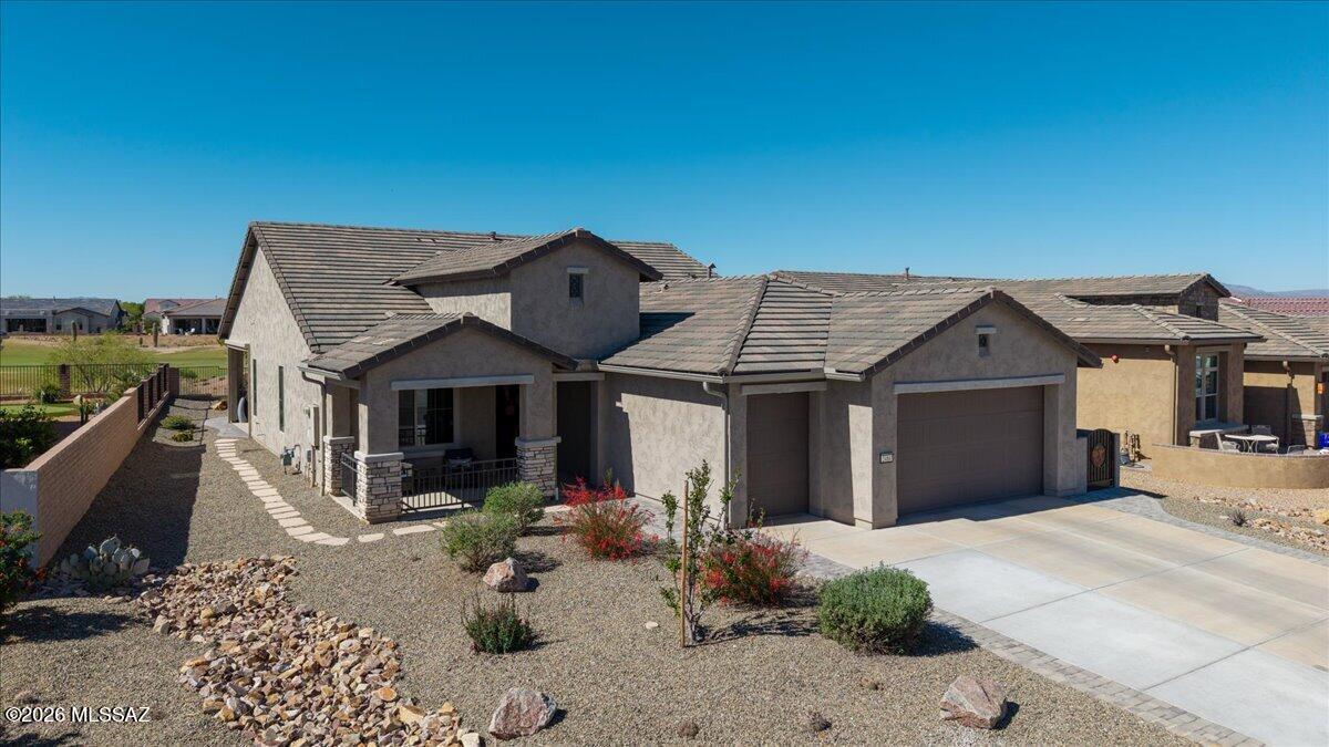 Luxurious 2 bedroom plus den, 2.5 bath home in the prestigious gated community of Quail Creek, offering resort-style living and stunning mountain views from your golf course lot. From the moment you arrive, the beautiful custom security door sets the tone for the elegant interior, welcoming you into a thoughtfully designed 1916 sq ft floor plan ideal for both everyday living and entertaining. The gourmet kitchen features quartz countertops, gas cooktop and convection oven, making it a dream for home cooks and entertainers alike.  A versatile den provides the perfect space for a home office or hobby room, while the split-bedroom design ensures privacy and comfort for owners and visitors. Outside enjoy tranquil golf course vistas and mountain views. Take advantage of extended 2.5 car garage.
