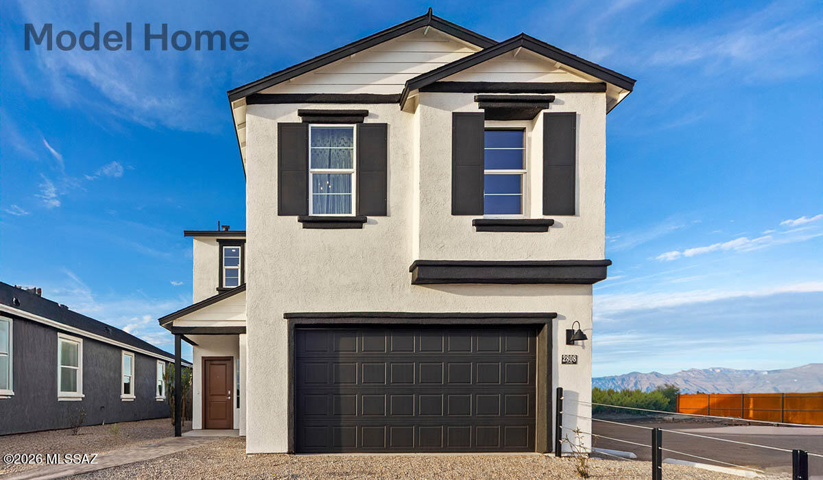 Welcome to life in the highly sought-after community of Rancho Sahuarita! This beautiful two-story home offers 3 bedrooms, 2.5 bathrooms, and the perfect blend of comfort, convenience, and community living. Beyond the home itself, you'll enjoy everything that makes Rancho Sahuarita one of Southern Arizona's most desirable master-planned communities. Residents have access to a stunning community lake, scenic walking paths, neighborhood parks, playgrounds, and beautifully landscaped common areas that create a true resort-style atmosphere. Whether you enjoy morning walks along the water, weekend family outings, or simply relaxing in a picturesque setting, this community offers something for everyone.