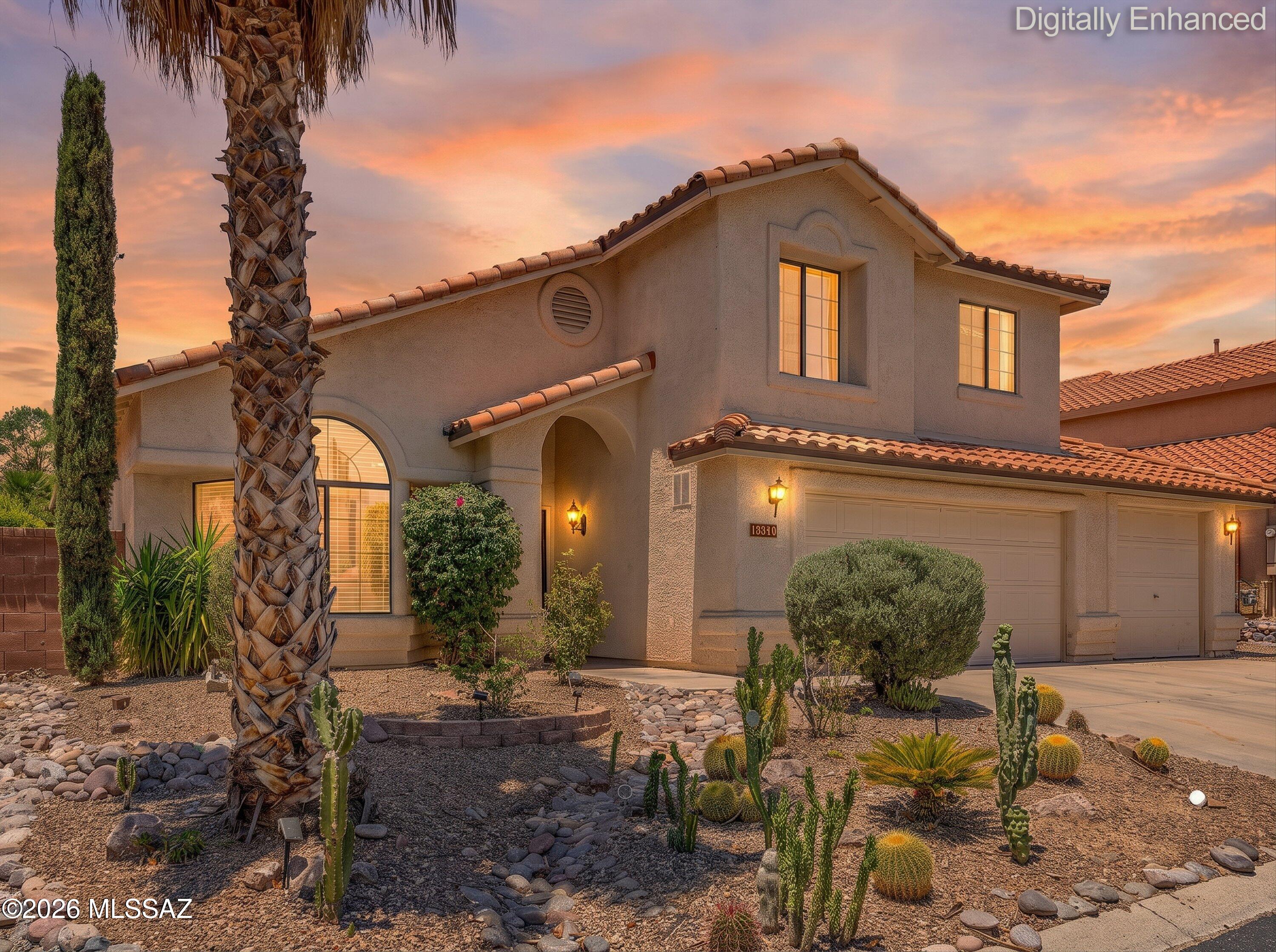 Discover your forever home in the highly-sought-after Oro Valley, Villages of La Canada. This stunning two-story boasts over 2800 sq ft of living space, featuring 4 bedrooms plus a den-perfect for your home office or playroom. Come inside past the 3 car garage & meticulously landscaped front yard you'll find the perfect layout for entertaining with new upstairs flooring adding a modern touch. Out back relax in your private oasis, with mature fruit trees, and a Pebble TEC pool with new decking ideal for cooling off in the Az sun. Enjoy peace of mind with a view, no rear neighbors and a New Roof! Located in a gated community, with easy access to shopping, dining, and fun activities as well as wonderful schools. Don't miss the opportunity to call this place home! Schedule your showing today