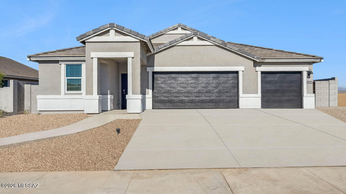 Stunning 4-bed, 3-bath home in the sought-after Saguaro Bloom community! Enjoy mountain views, soaring 9' ceilings, quartz countertops, and a chef's gourmet kitchen--perfect for entertaining. Energy-efficient features include a tankless water heater and spray foam insulation. A spacious 3-car garage adds convenience. Saguaro Bloom offers a vibrant lifestyle with a heated pool, gym, clubhouse, parks, and scenic trails. Don't miss this blend of comfort, style, and desert beauty--schedule your private showing today!