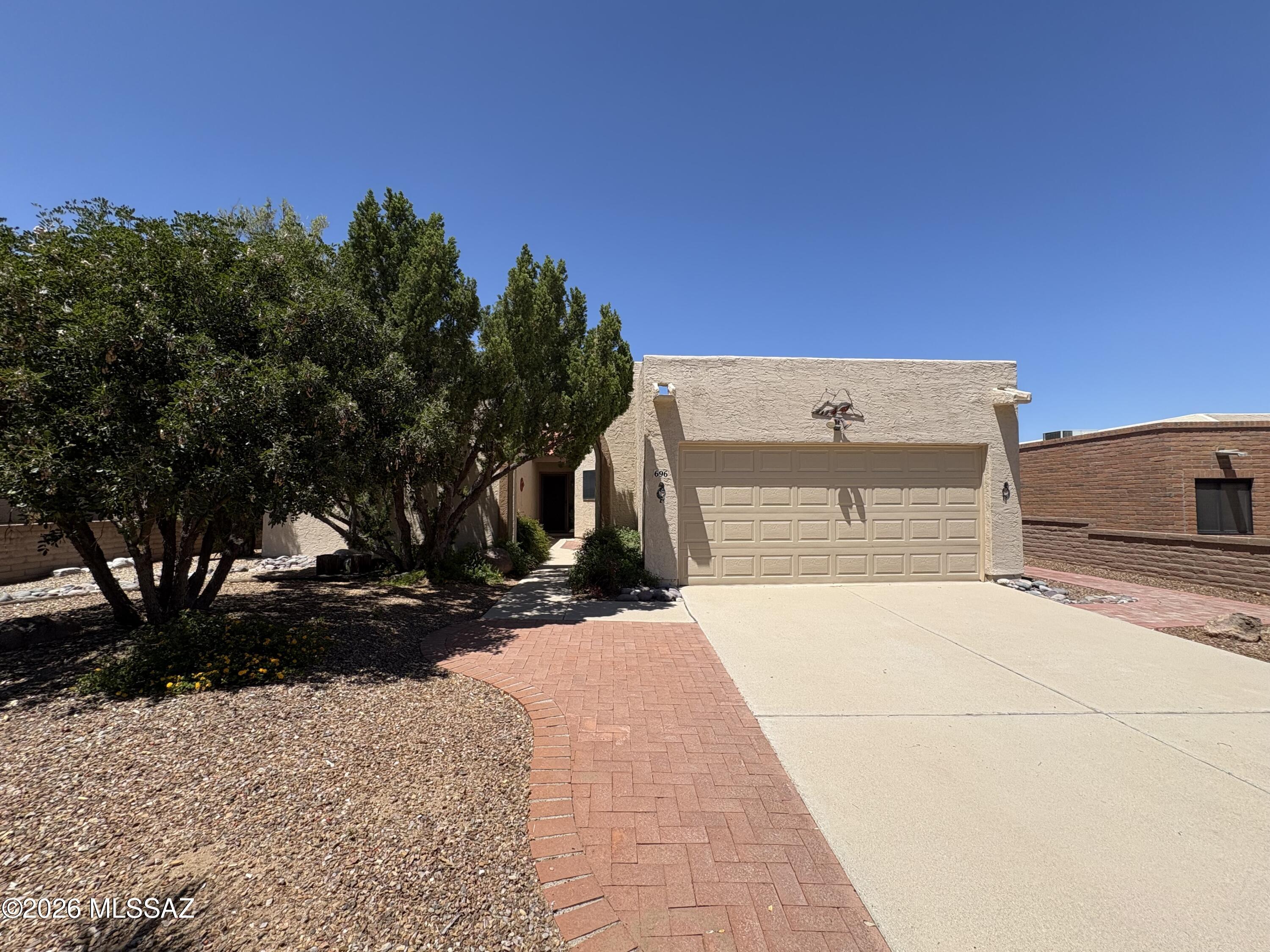 Ready for new owners- 55+ community, come see what this home has to offer. Comfortable space with Large bedrooms, cedar closets, a versatile den that can easily serve as a home office, guest room, or hobby space. Large Kitchen with ample storage.  Spacious AZ room heated & Cooled ( Not included in living square footage) providing additional year-round living space in every season. The inviting courtyard entry creates a welcoming first impression, while large windows throughout the home bring in beautiful views of the surrounding landscape.
Outside, enjoy a spacious backyard retreat with low-maintenance desert landscaping mature trees,  peaceful sitting areas designed for relaxing Arizona evenings. The oversized lot offers room to enjoy outdoor living maintaining privacy and tranquility.