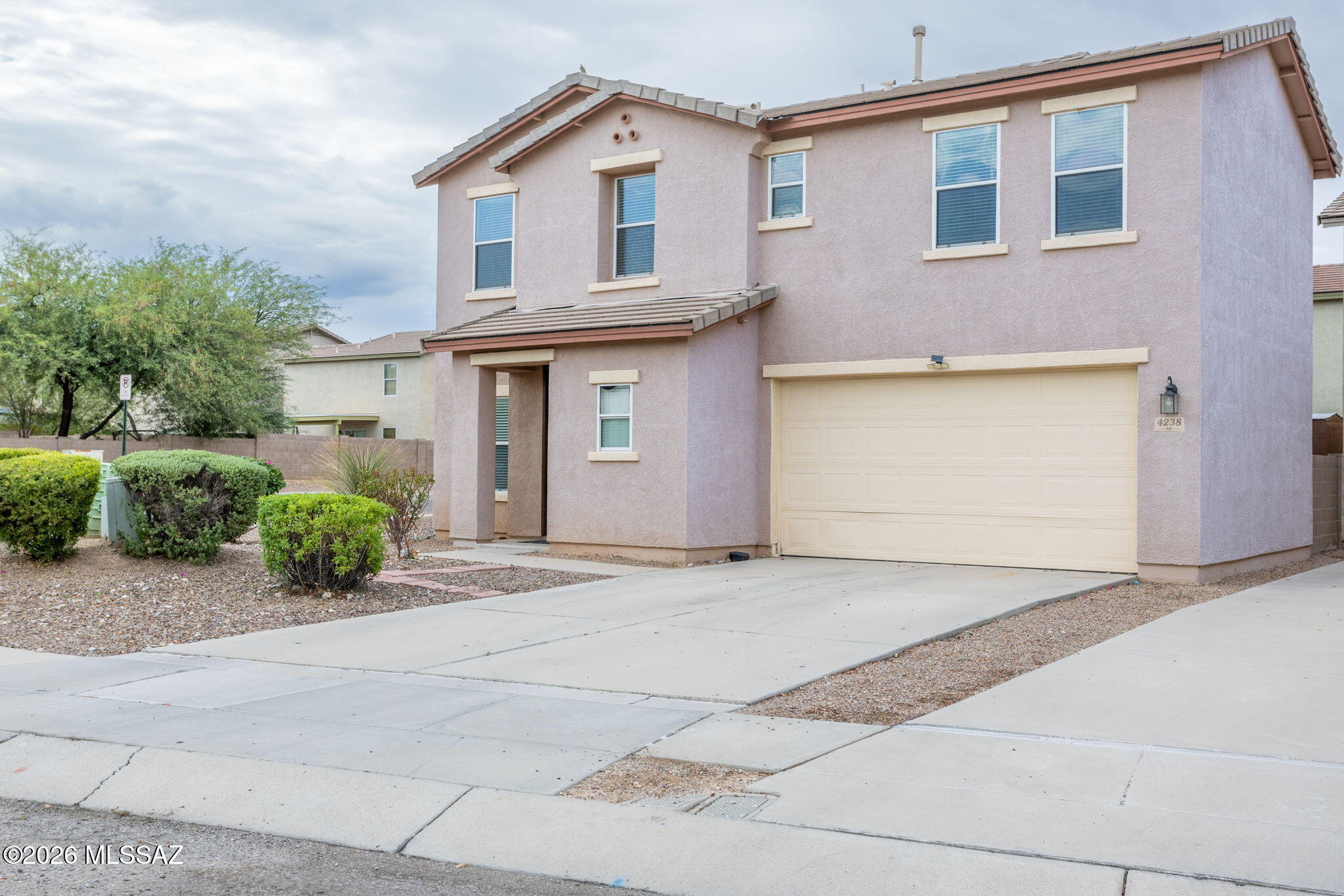 Well maintained 4 bedroom 3 bath home in the center of town. Corner lot and close to major attractions like UofA, parks, hospitals, schools, dinning and many more. This beautiful neighborhood offers walking and nature path. 
All bedrooms are upstairs. Mountain view from most of the bedrooms and backyard. Ceiling fan is installed in all bedrooms. Open kitchen with lots of storage.