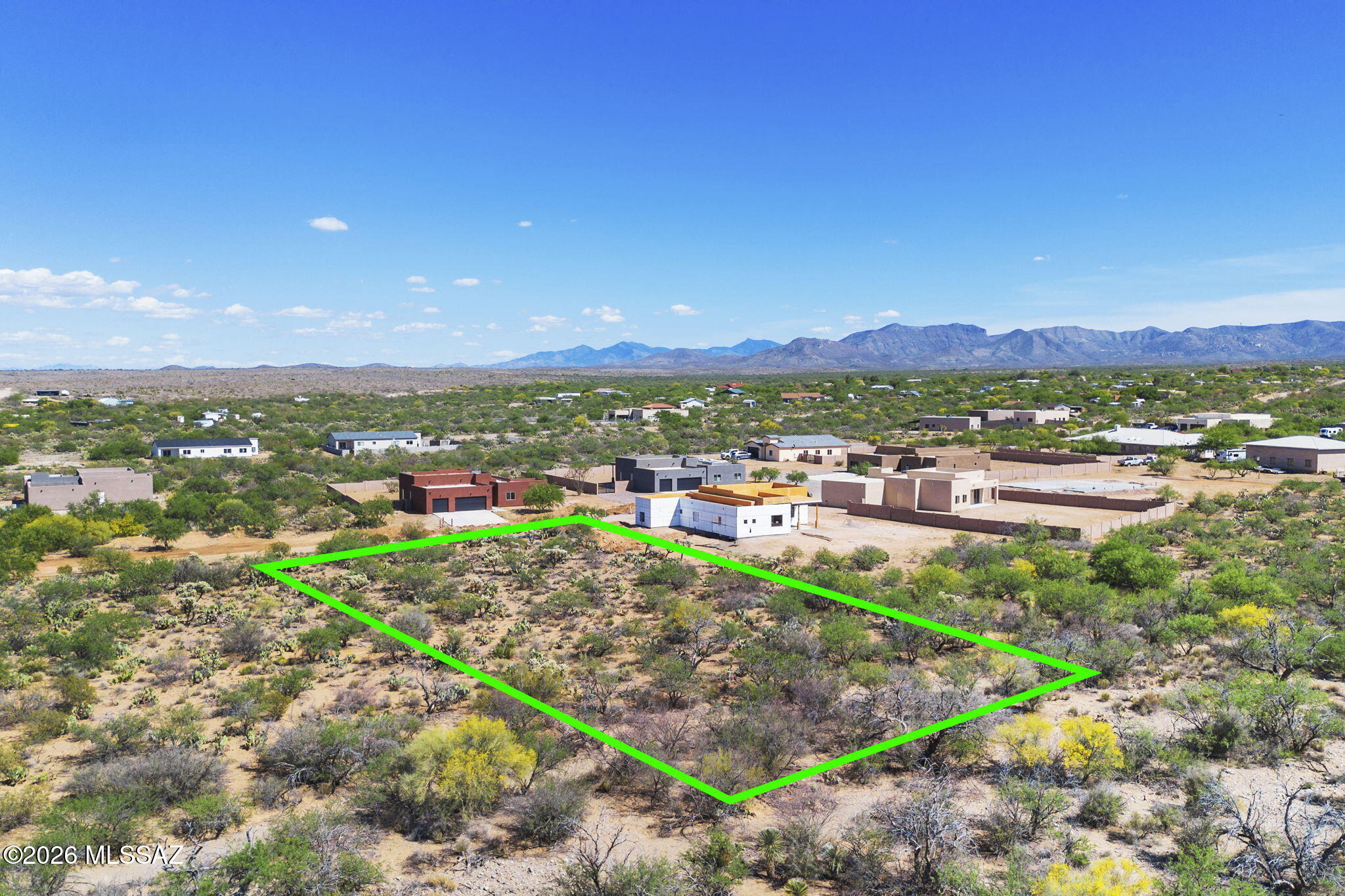 Ready to build! Flat lot on a paved road with utilities at the lot line! It doesn't get better or easier than this one. Bring your toys, work trucks, RV's, and boats, it is all allowed in this minimally restricted community. Horses are allowed as well! Gorgeous vegetation makes this lot very desirable. Take a look at this lot TODAY! The lot next door at 995 N Blue Slate is also available by the same owner. Buy one or buy both. Opportunity abounds!