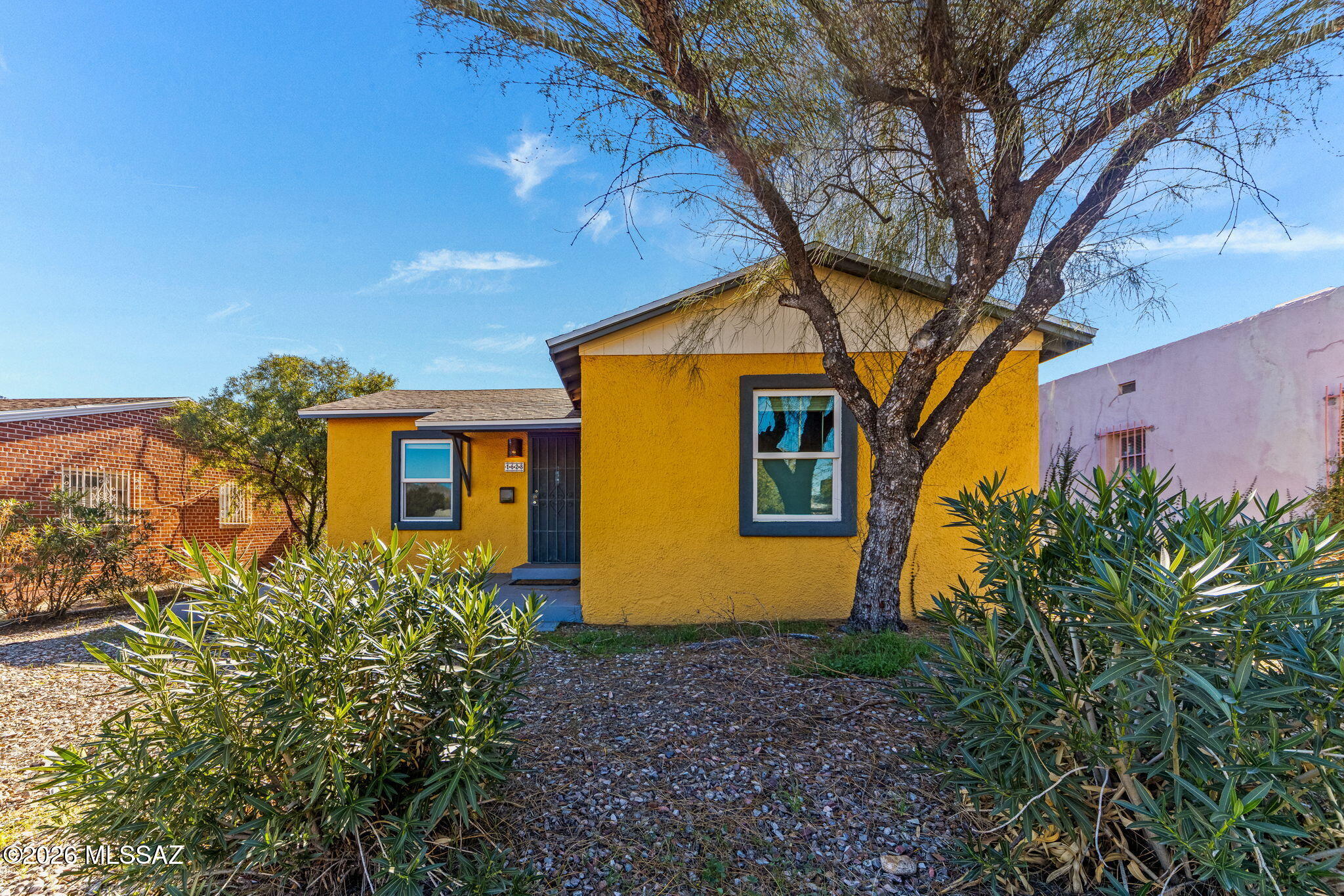 Located in the highly desirable Jefferson Park neighborhood, this charming 2-bedroom, 2-bathroom home offers unbeatable central Tucson living just minutes from the University of Arizona and Banner University Medical Center. The functional floor plan features light-filled living spaces, generously sized bedrooms, and a private primary suite with an en-suite bath. Enjoy a low-maintenance outdoor space ideal for relaxing or entertaining. Jefferson Park is known for its tree-lined streets, strong community feel, and close proximity to dining, shopping, and cultural attractions. Perfect as a primary residence, university-area retreat, or investment opportunity.