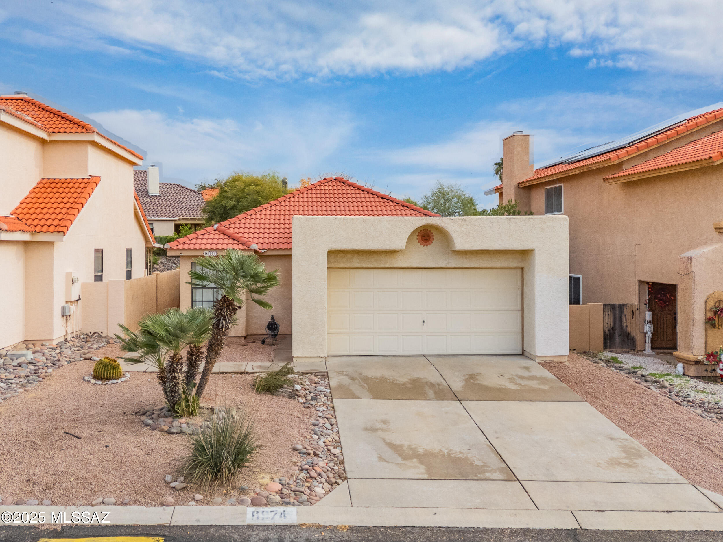 Welcome to this beautifully maintained Northwest Tucson gem, perfectly tucked inside a quiet, established neighborhood just minutes from shopping, dining, and everyday conveniences. Step inside to an inviting, light-filled layout with an open great room, vaulted ceilings, and neutral finishes that make the home feel warm and spacious. The kitchen offers ample counter space, Stainless steel appliances, upgraded kitchen sink, and cabinet handles that compliment the functional layout and encourages the ability to cook and simultaneously entertain keeping you connected with family and friends! Complete with a two car garage and large saguaro cacti being the southwest straight to your backyard! Book your showing today!