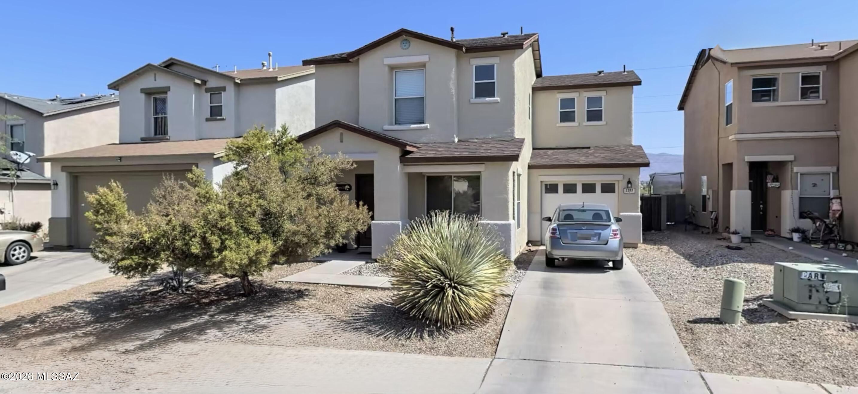 Welcome to this beautifully maintained 3-bedroom, 2-bath, two-story home in Tucson! The functional floor plan offers comfortable living spaces with abundant natural light, creating a warm and inviting atmosphere. The spacious kitchen flows seamlessly into the dining and living areas, making it ideal for everyday living and entertaining. Upstairs, you'll find generously sized bedrooms, including a relaxing primary suite with ample closet space. Step outside to a private backyard with plenty of room to entertain, garden, or simply unwind. Conveniently located near shopping, dining, parks, schools, and easy freeway access, this home offers the perfect combination of comfort, convenience, and value. Don't miss your opportunity to make this Tucson home your own!