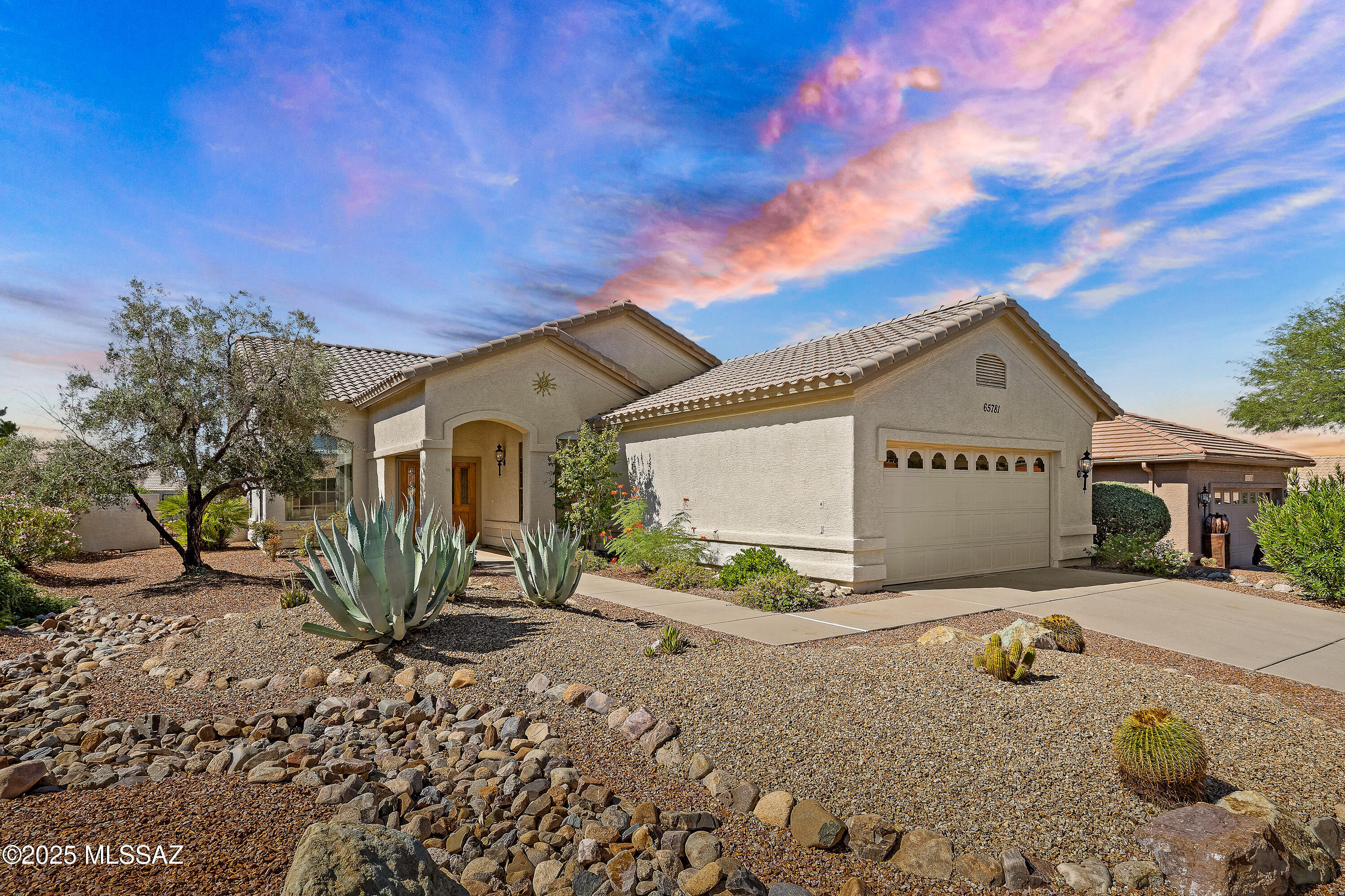 Beautiful Ventana Model in SaddleBrooke Two... Move In Ready!

Welcome to this well-maintained 2-bedroom, 2-bath Ventana model located in the desirable active adult community of SaddleBrooke Two, just north of Tucson. Offering 1,850SF of living space plus a spacious 130SF Arizona Room, this home is perfect for year-round living or a seasonal retreat.

Enjoy modern upgrades and thoughtful features throughout, including:

2019 HVAC system, tankless water heater & instant hot water
Solar screens for energy efficiency
Central vacuum system
Extended garage with built-in cabinets and utility sink.
Private patio off the primary bedroom, perfect for morning coffee or evening relaxation.
Low-maintenance backyard with a putting green and small citrus grove.