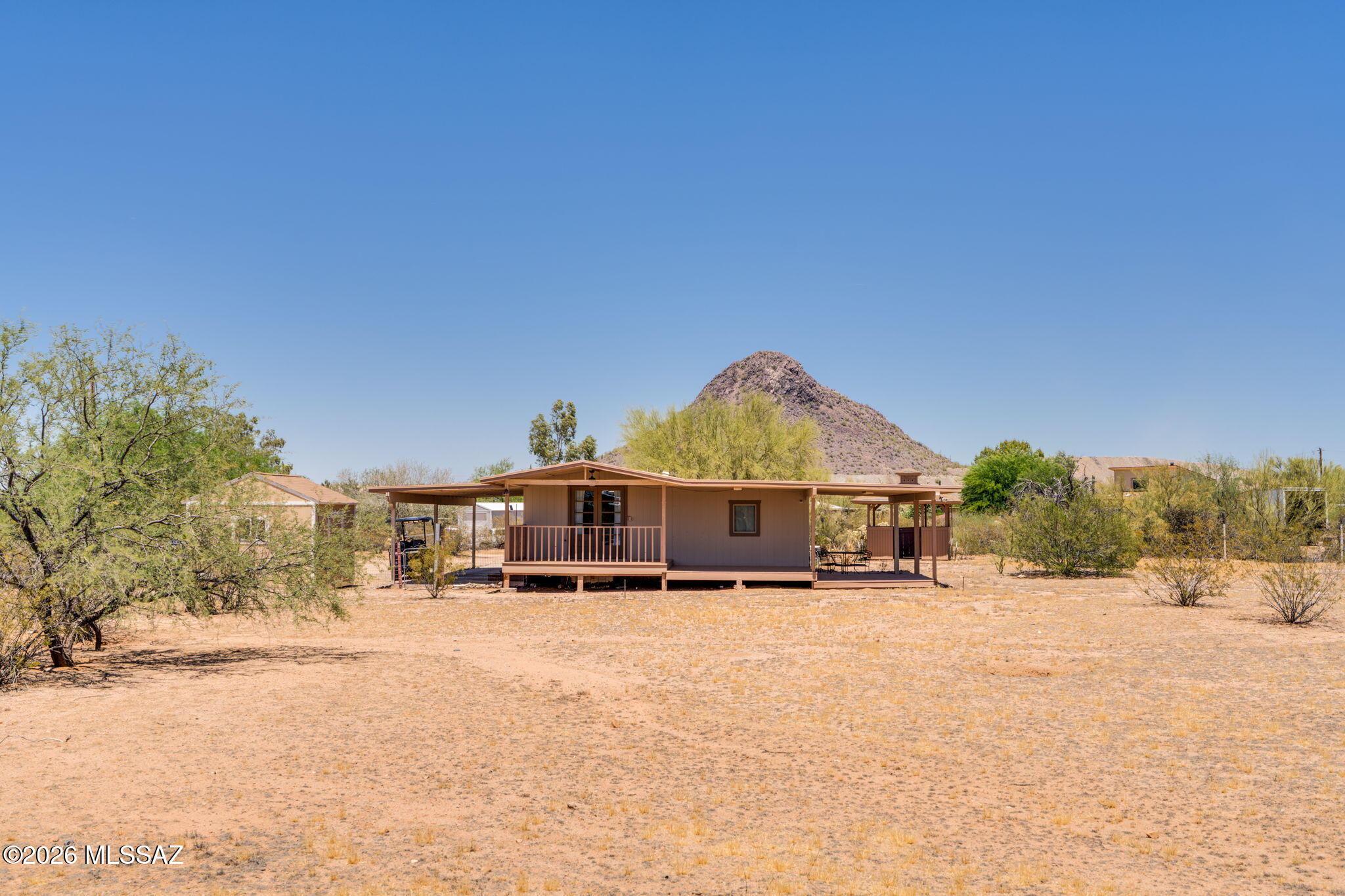 Peace, Quiet & Serenity await on this stunning G-1 Property on over an acre! This beautifully updated home features a brand-new kitchen, newly remodeled bathrooms, and a gorgeous wraparound covered patio perfect for enjoying breathtaking mountain sunrise and sunset views. Large Tuff Shed for all your additional treasures. 2 carports, 1 extended. 2 Mini splits & 1 A/C window unit. Relax and unwind in the walk-in jacuzzi tub in the 2nd bathroom, or create your own private outdoor retreat with the gazebo already waiting for your future spa or jacuzzi. With 2 carports and plenty of space to enjoy the outdoors, this property offers the perfect blend of comfort, privacy, & scenic beauty. Financing available.