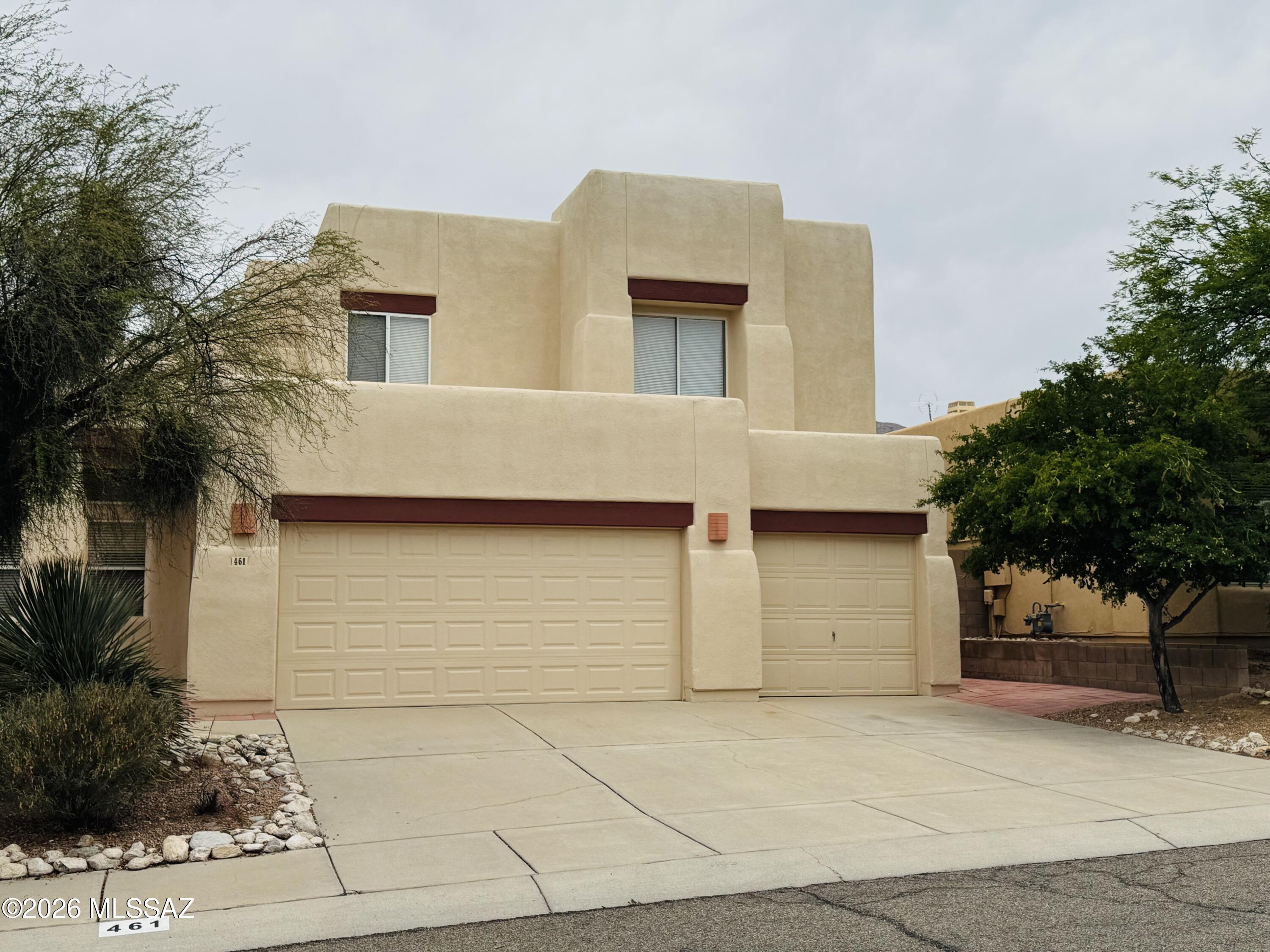 5-Bed Santa Fe Style Home with Views - Great Value, Sold As-Is!Don't miss this high-potential 5-bedroom, 3-bathroom home in Tucson's Rancho Arboleda community. Offering 2,466 square feet of open-concept living space, soaring ceilings, and a rare 3-car garage, this property provides a fantastic canvas for your personal updates. Relax on the primary suite's private balcony and take in unobstructed views of the Santa Catalina Mountains, or enjoy the private backyard that opens directly to a quiet common area. The home is being sold completely as-is, offering an exceptional opportunity for buyers seeking strong value in a prime Northwest location close to excellent dining, shopping, and community amenities. This home offers the perfect blend of suburban tranquility and modern convenience in a prime Northwest location.