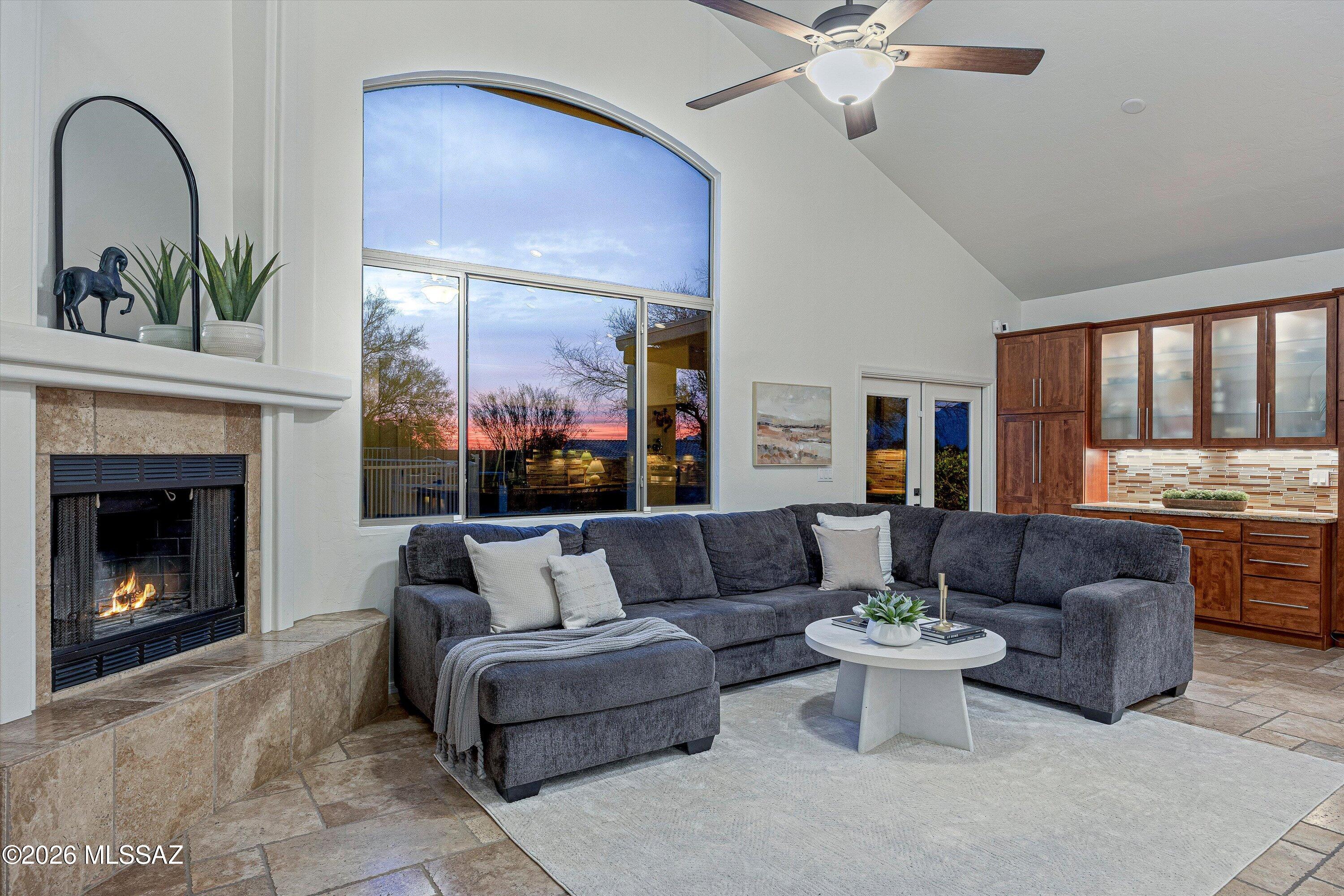 honestly, when i walk into this house, i don't want to leave. it has the unspoken feeling of home, where you just want to plop down on the couch after a long day, turn on the gas fireplace and grab your favorite snack from the pantry. through the windows you see nothing but sunset skies and desert landscape. i love how the two downstairs bedrooms connect through the most darling bathroom, and how the upstairs bedrooms enjoy vaulted ceilings and mountain views. the kitchen was reimagined and expanded by the homeowner, to extend the cabinetry and counter space for warm meals and entertaining friends and family. i can't explain it, it just feels like a place someone would love to call home. and after 29 years with its original owner, it's ready for its next chapter. Buyer to verify all facts and figures, including those in MLS.