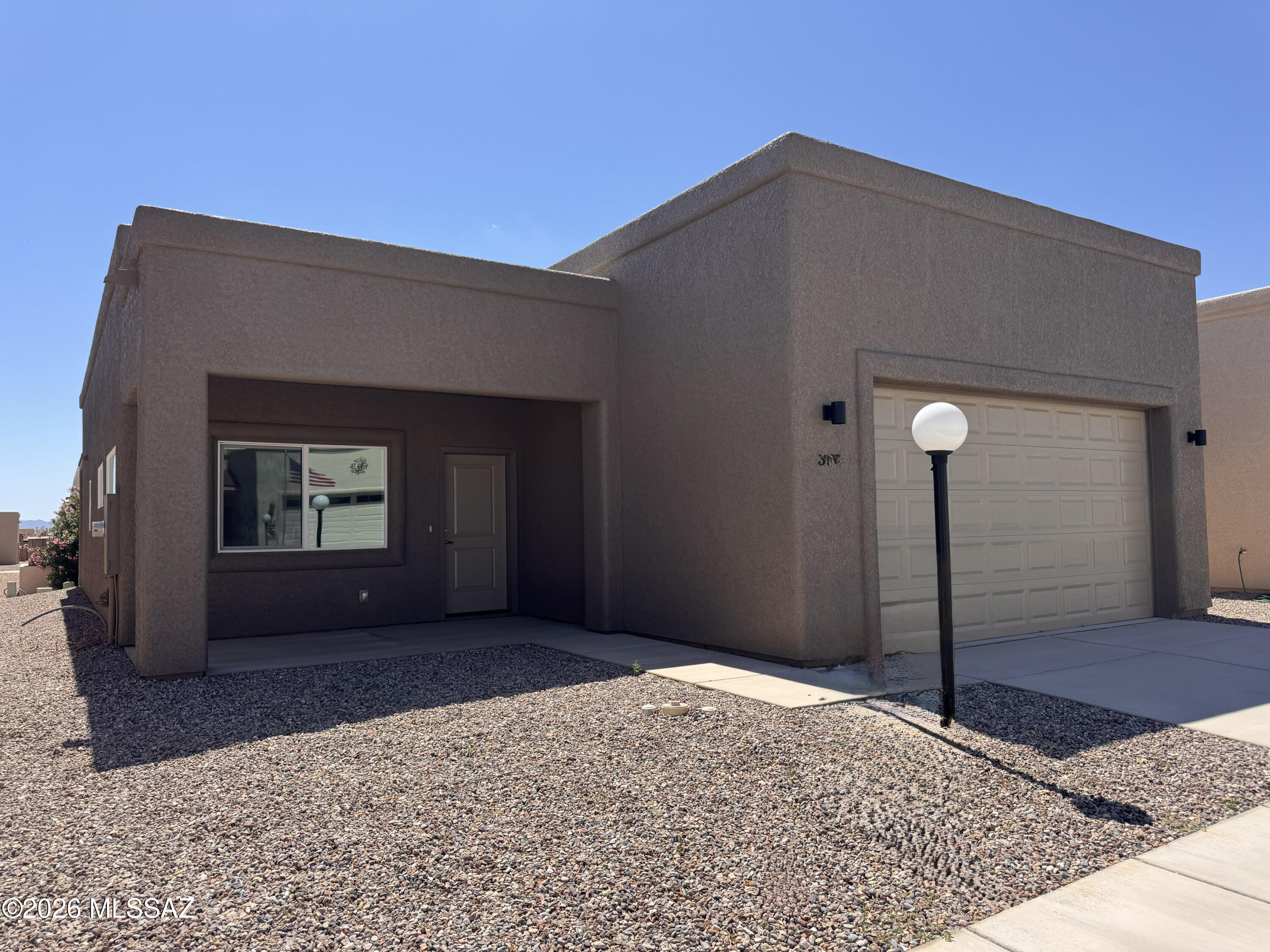 Brand new spec home is ready for new owners!  Fabulous 55+ active community with unrivaled amenities in Sierra Vista.
Upgraded interior includes 42'' cabinets, upgraded tile, quartz countertops, ADA toilets, 42'' wide hallways, 36'' doors to all rooms.  Property taxes and trash pickup are included in the resort fee as well as the road maintenance.  Lots of activities and classes, potluck dinners, bingo, billiards, ping-pong, card games at the card house, pickleball, yoga, swimming and hot tubbing.  Movie room complete with popcorn maker.  You're going to love this place! Roof is torch-down.