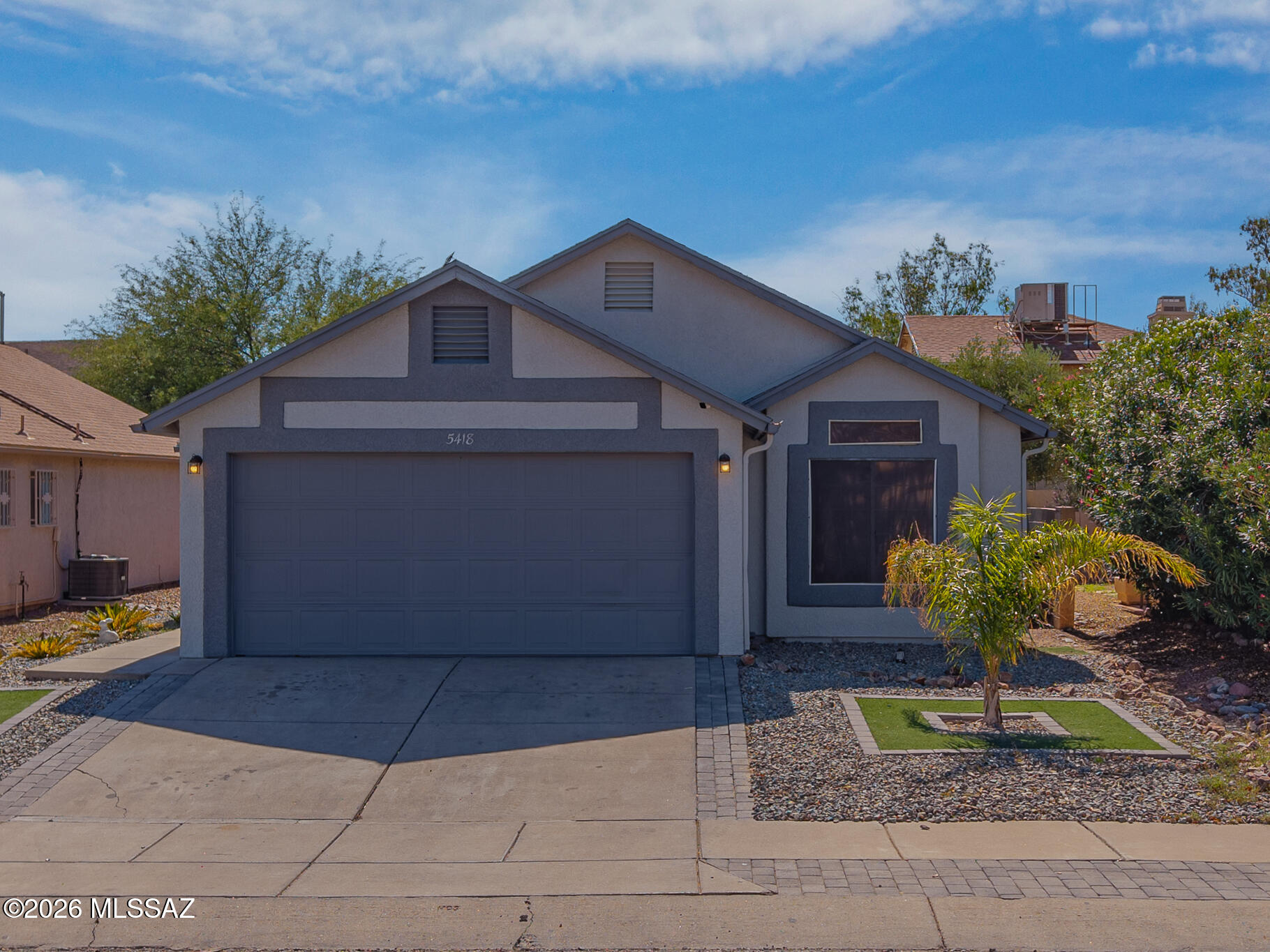 Welcome to this beautifully updated 3 bedroom 2 bathroom home in the heart of Midvale. From the moment you arrive, you'll appreciate the inviting curb appeal, spacious front patio, and modern finishes throughout. Inside, soaring vaulted ceilings and an open concept layout create a bright and airy feel that's perfect for everyday living and entertaining. The stylish kitchen features stainless steel appliances, ample cabinet space, and flows seamlessly into the dining and living areas. The spacious primary suite offers a stunning remodeled ensuite bathroom with dual sinks and designer finishes. Step outside to your private backyard complete with low maintenance artificial turf, paver patio, string lights, and plenty of space for gatherings, pets, or play. Conveniently located near shopping, dining, parks, schools, and freeway access, this move in ready home offers comfort, style, and an unbeatable location. Don't miss your opportunity to make this Midvale gem yours.