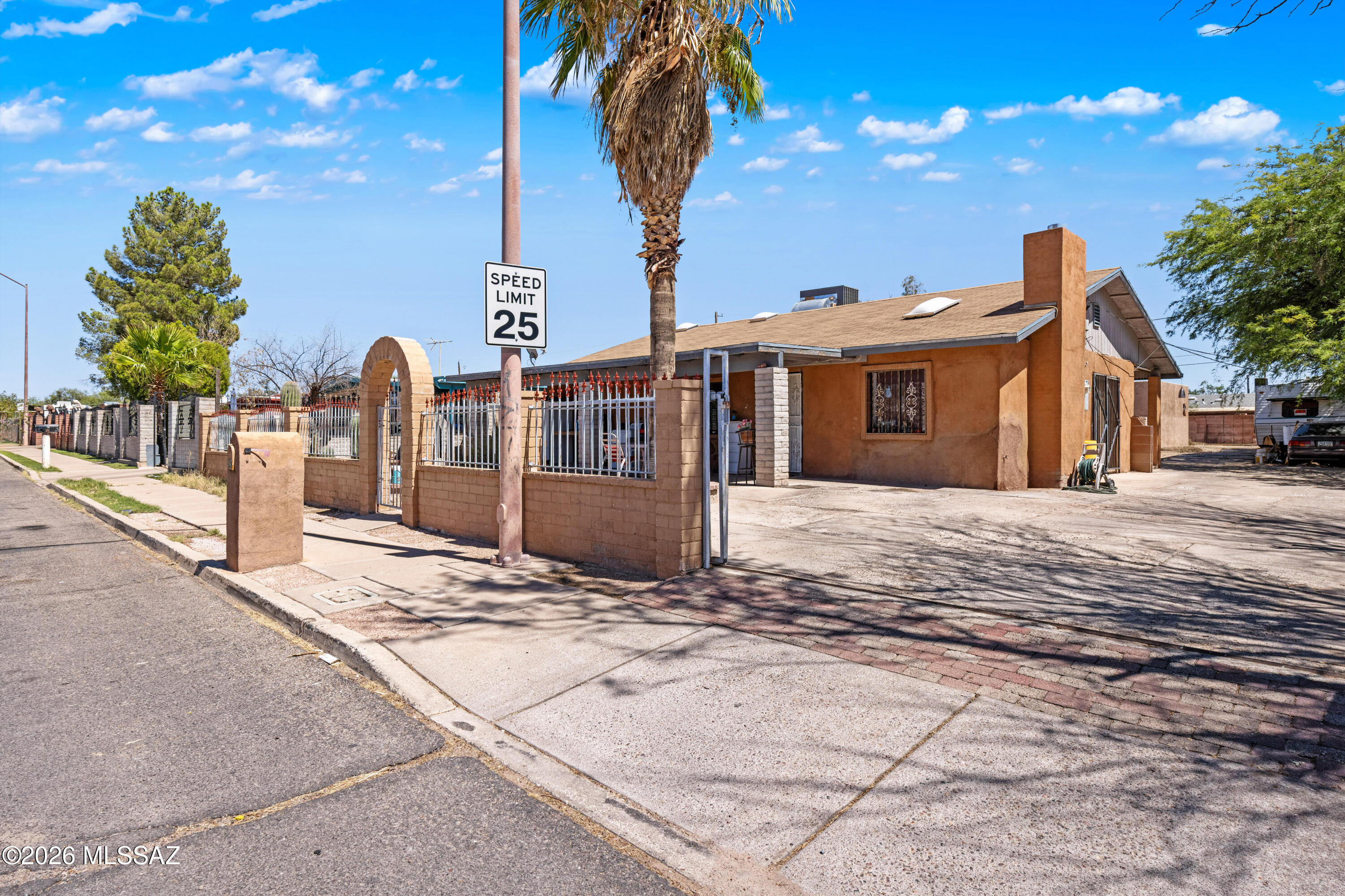 Investor alert in Tucson's Sunnyside/Irvington corridor: this property offers the rare chance to explore three potential rental spaces for the price of one acquisition. Originally a 4-bedroom home, the seller has converted it into two 2-bed, 2-bath living areas, plus a rear studio/casita--creating a setup that may outperform the old 1% rule investors still chase. Depending on rents, expenses, and final numbers, this could pencil closer to a 1.5% rent-to-price scenario. With gated frontage, multiple entries, ample concrete parking, and access near Tucson Spectrum, I-19, Mission Manor Park, shopping, dining, and south-side employment hubs, this is the kind of value-add opportunity serious buyers will want to analyze fast. Buyer to verify permits, rents, and use.