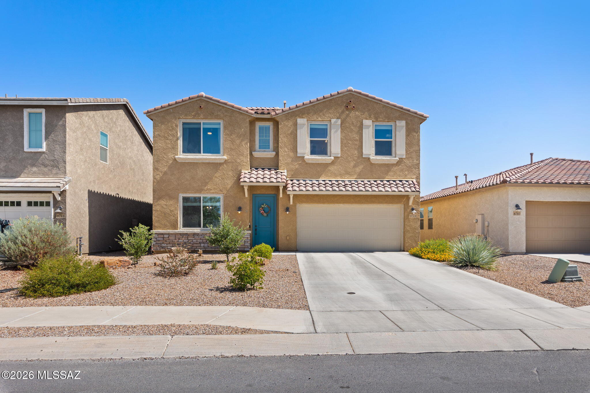 This home is range priced from $499,000-$525,000. Experience refined living in this beautifully designed home in the sought-after Saguaro Trails community. The open-concept floor plan offers spacious living with a gourmet kitchen featuring granite countertops, upgraded cabinetry, stainless steel appliances, a gas cooktop, built-in oven and microwave, and a walk-in pantry. A versatile flex room, expansive loft, and generous walk-in closets provide exceptional functionality. Thoughtful upgrades include 8-foot interior doors, executive-height vanities, two-tone paint, gorgeous backyard with covered patio and spacious turf. Just a three minute walk to resort-style community amenities, pool, splash pad, parks, walking trails, dog park, pavillion and a prime location near top-rated Vail schools.