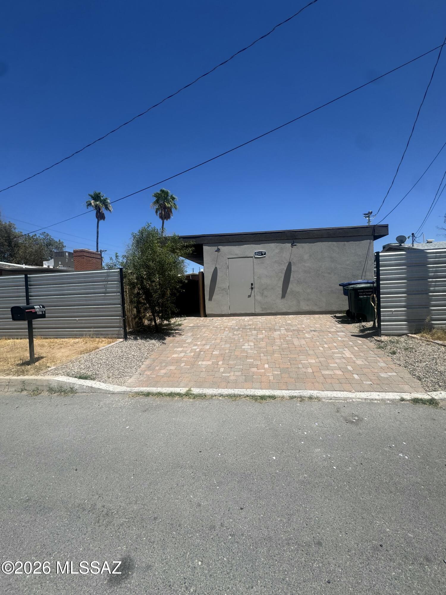 Modern casita located in the heart of Tucson, conveniently located near major shopping, dining and hospitals, 10 minutes from the University of Arizona.  This 2 bedroom , 1 bath unit is completely separate fro the main house , fully fenced and gated for security. Off street parking for 2 vehicles with additional parking on street.  Low maintenance landscape and new appliances.  In unit washer and dryer and triple mini split systems.  Owner pays water and trash.  tenant pays electric and WIFI.