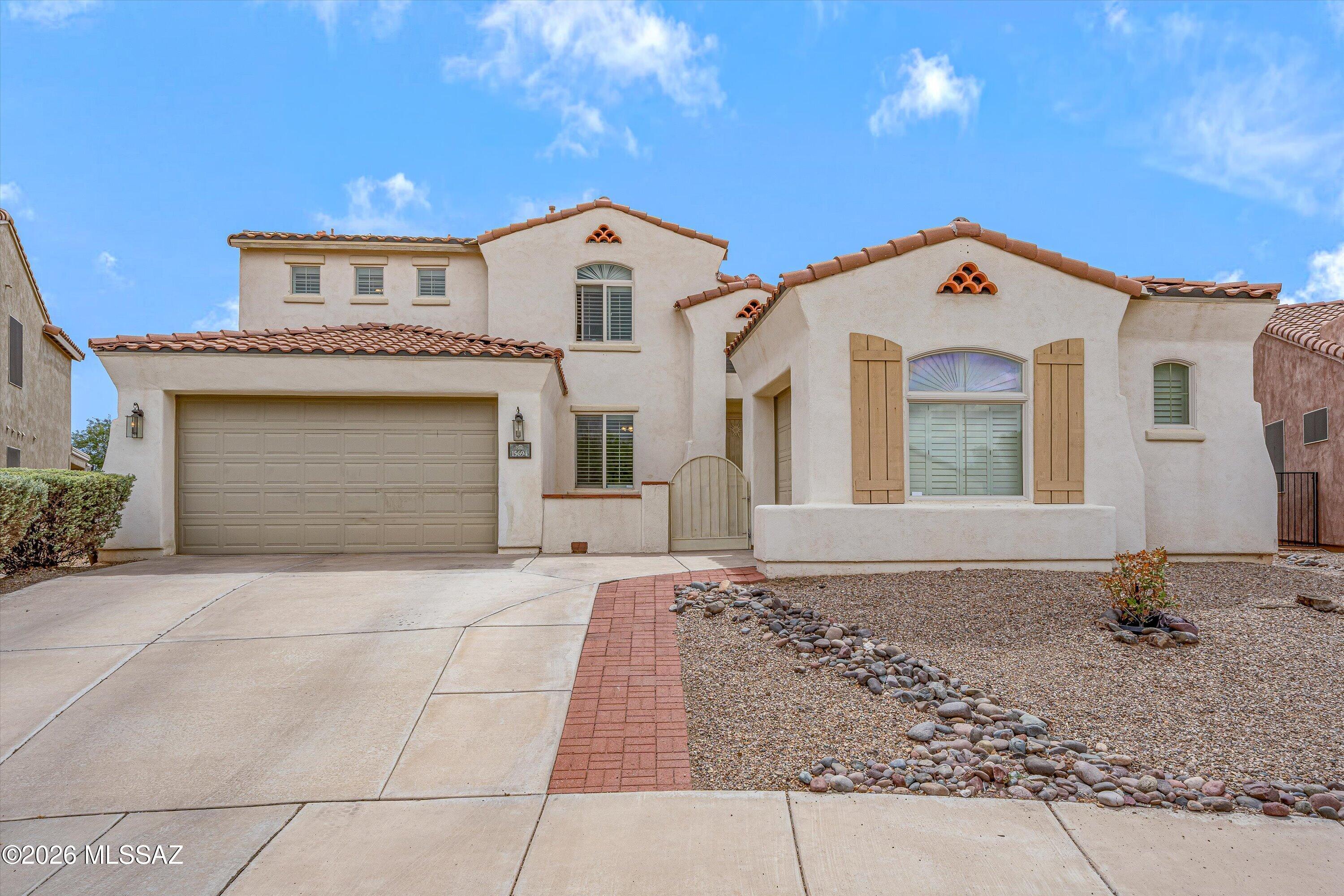 Welcome to this beautifully maintained Pulte home on a large premium cul-de-sac lot in the highly desirable Rancho Sahuarita community! Enjoy spectacular Arizona sunsets from your own private backyard oasis with a heated pool and spa. Solar panels add energy efficiency. Features include a charming front courtyard, three-car garage, vaulted ceilings, Brazilian Koa wood flooring, plantation shutters, a versatile den, along with an open-concept family room and kitchen with reverse osmosis. The downstairs primary suite offers privacy and convenience, while upstairs you'll find a large loft and three generously sized bedrooms. Just minutes away, enjoy resort-style community amenities including a 10-acre lake, fitness center, splash parks, pools, trails, parks, and more! Site: https://ranchosahuarita.com/lifestyle/pools-amenities/