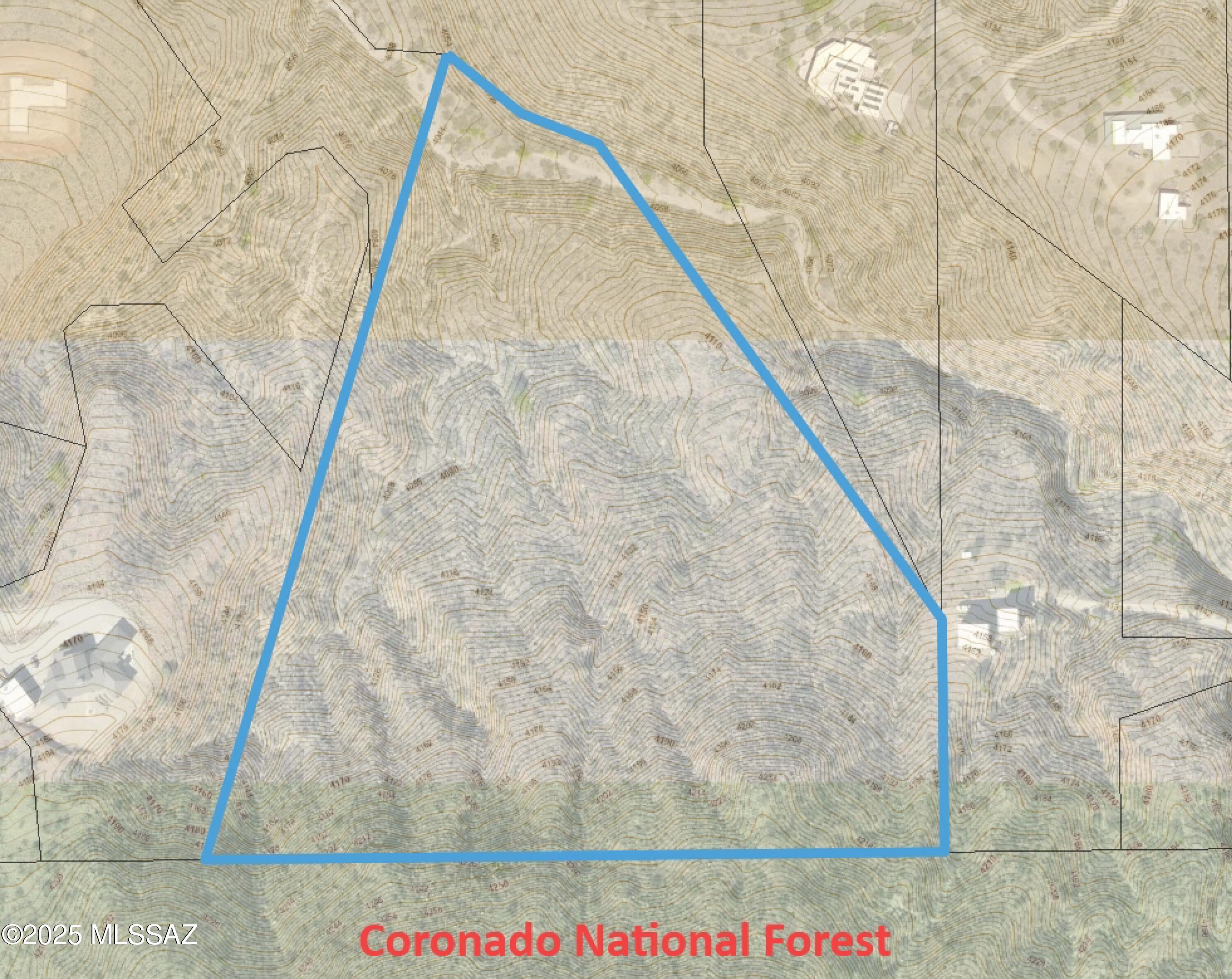 Secluded 15-acre parcel with unobstructed mountain and thousands of acres of national forest as your backyard located in the Santa Rita Mountain Foothills.  This property is in a stunning location, near paved roads, and is also in the award-winning Vail School District and just 10 minutes away from restaurants/services and less than 20 minutes to I-10. Existing well with connection available, along with electric service is just 200 feet from the northwest corner of the property. Access/utility easement has been graded to within approximately 200 feet as well. NO HOA!  This is a  spectacular property that is ready for you to build your dream home, or family compound. Experience the tranquility of the desert with fantastic views of the surrounding mountains next to the national forest. Parcel can be split into two or three parcels if the Buyer chooses to providing an opportunity to share the expenses associated with providing the utilities, and access. New lot loan program available with only 20% down for qualified buyers, Contact Agent for more information!