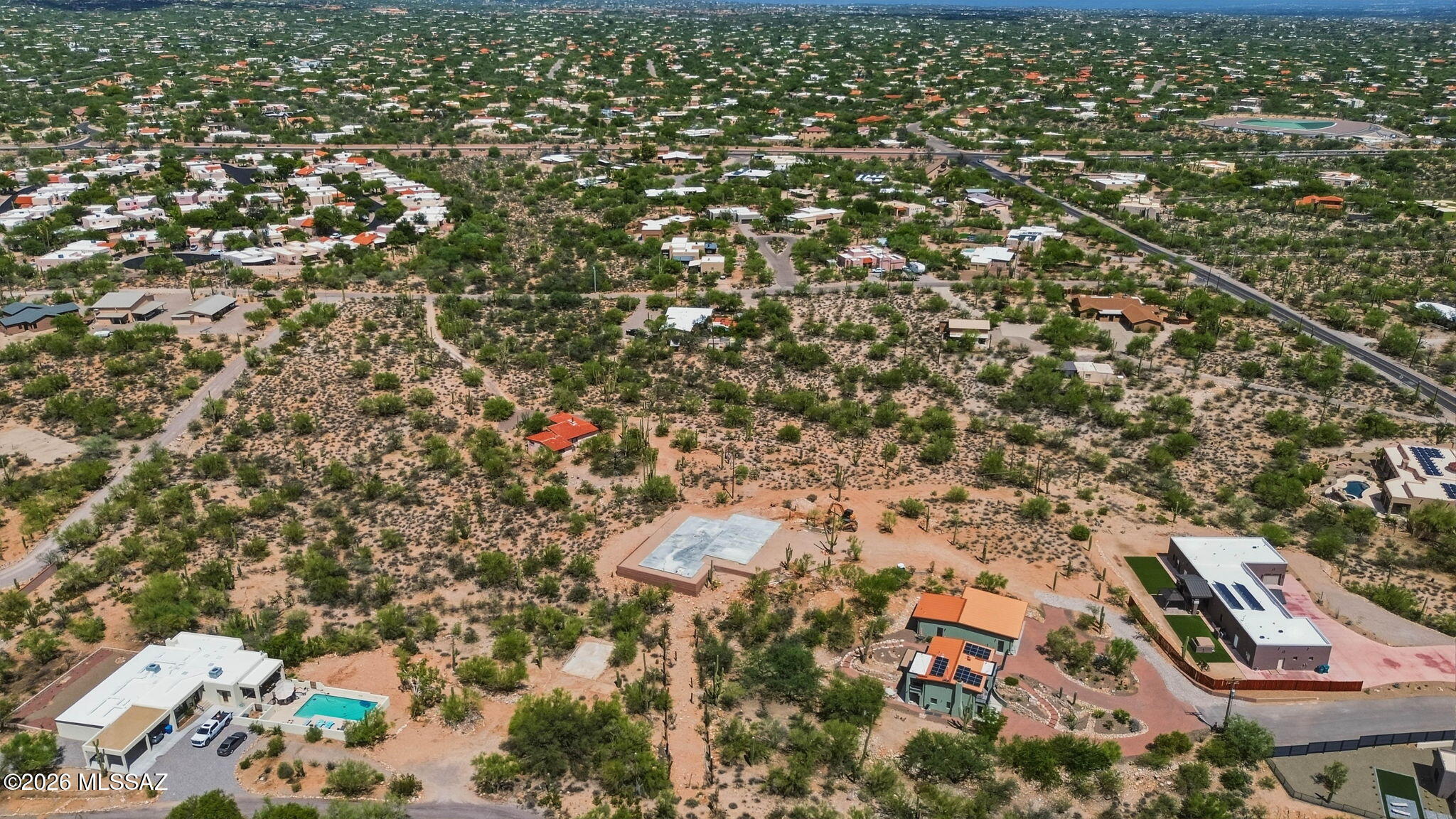 Nestled on a private cul-de-sac on the highly sought-after north side of town. This new lot offers a rare opportunity to build a custom residence in a prime location. Conveniently located near upscale shopping, restaurants, and near the loop! Surrounded by majestic saguaros and lush native desert vegetation, but with the in town feel. Build your dream home and enjoy the sunrise mornings and sunset evenings.