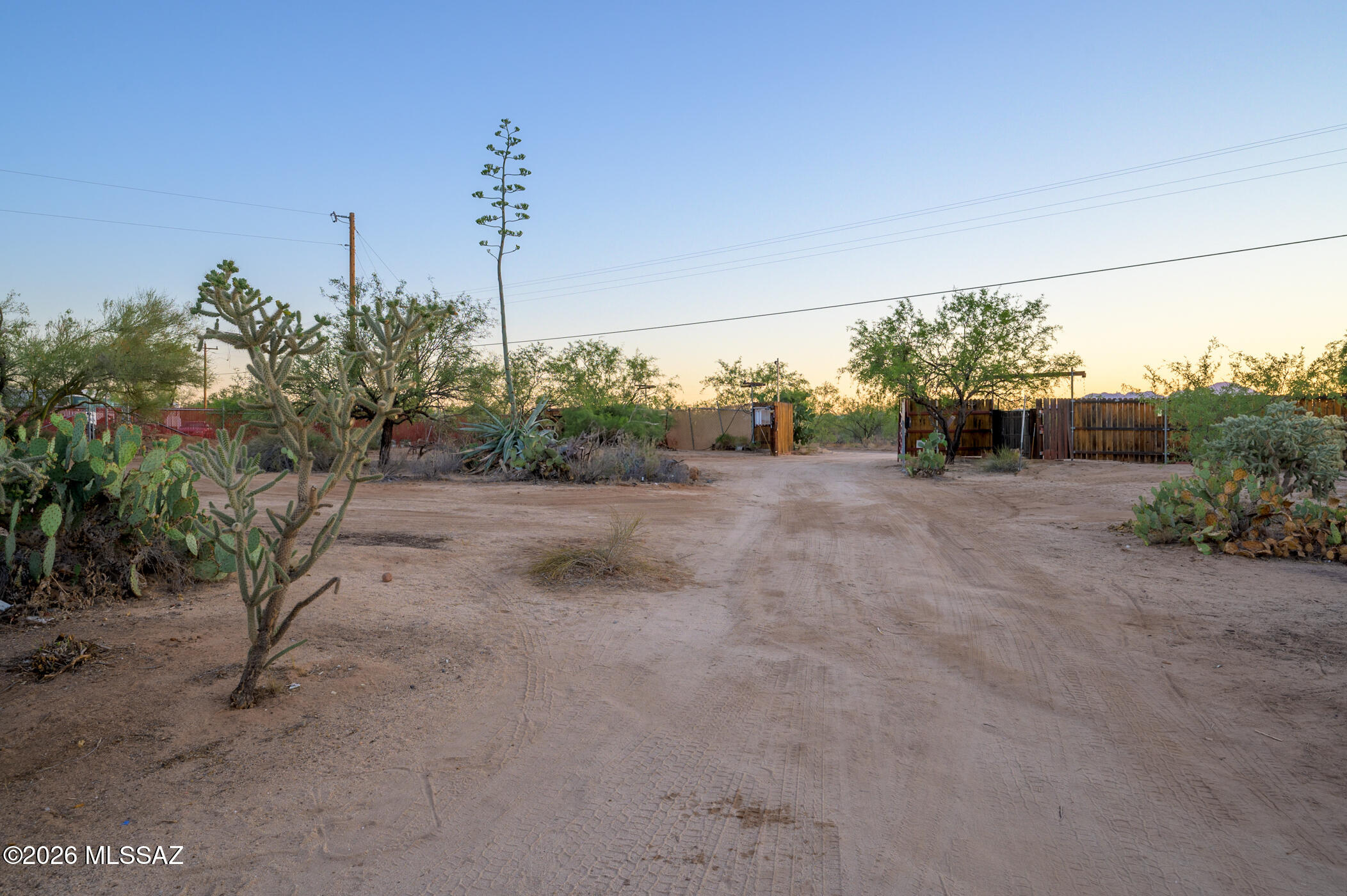 Here's your chance to claim a piece of the Arizona desert at an unbeatable price point. Priced primarily for its generous lot, the land features mature native desert growth, including striking saguaro cacti and natural wildlife that bring the Sonoran landscape to life. A single-wide trailer is included on-site, offering renovation potential for buyers ready to create something uniquely their own. Whether you envision a desert retreat, a creative restoration project, or a long-term investment, this property provides a rare blank canvas at an accessible pride point. Schedule your visit today.