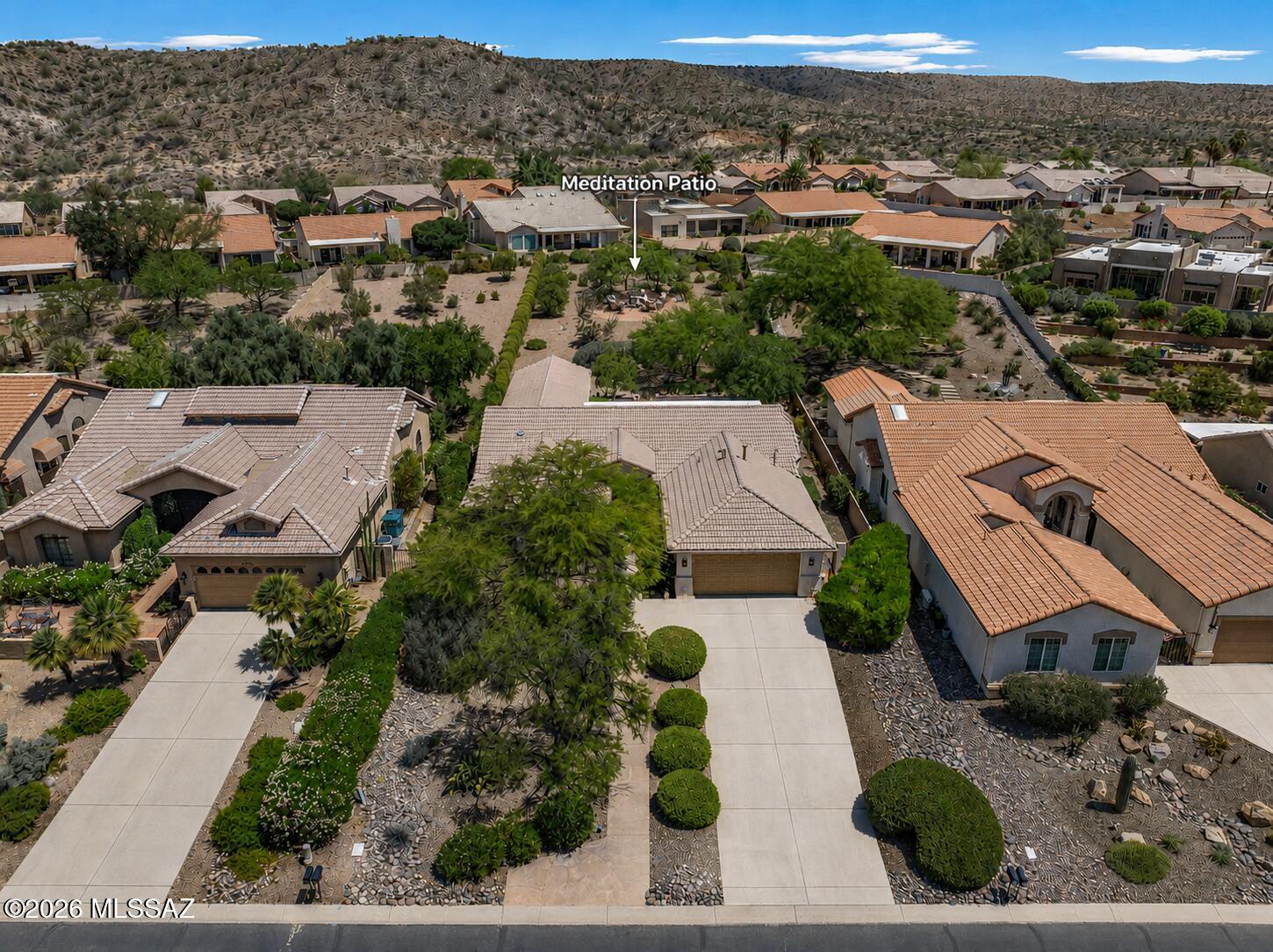 Exceptional Opportunity in the Heart of HOA1.  Rarely Available Expanded Topaz Model on Nearly ½ Acre Lot from mediation patio enjoy sweeping mountain views. Pride of ownership shines throughout this uniquely modified extended Topaz model, lovingly maintained by the original owner and thoughtfully upgraded over the years. Ideally situated in the highly desirable HOA-1, this remarkable home offers 3 spacious bedrooms plus an oversized bonus room, creating exceptional flexibility for a home office, hobby space, guest retreat, or additional living area. Designed larger than the standard Topaz model, the home was originally constructed with an additional 2 feet added to each bedroom, creating 8 total additional feet of expanded living space rarely found in this floor plan. The oversized 19,721 sq ft lot (nearly ½ acre) provides incredible outdoor living potential with room to relax, entertain, and enjoy Arizona living at its finest.

Inside, the home features four solar tubes providing abundant natural light, and four ceiling fans for comfort and efficiency. The spacious primary suite offers a custom walk-in Classy Closet and opens through elegant glass French doors into a professionally built room addition completed in 2004 by Northwest Builders--featuring a built-in office, two large closets, private exterior access, and endless possibilities for use.

Major system upgrades provide peace of mind including two newer HVAC systems serviced twice annually by Chas Roberts, both equipped with electrostatic air purifiers and humidifiers, a new 40-gallon hot water heater with hot water recirculation system (February 2026), whole house SunTap water softener, and reverse osmosis system servicing both kitchen sink and refrigerator (maintained yearly).

The extended garage offers incredible functionality with 4 additional feet of depth, epoxy flooring, built-in storage on two sides and side yard access via man door. Additional improvements include a 5-foot extended driveway, new garage door and opener system (2023), and security doors on all exterior doors, including decorative security doors on family room and primary bedroom sliders.

Outdoor living is equally impressive featuring a large covered rear patio with two ceiling fans, a built-in gas barbecue with outdoor sink, expansive rear yard with raised seating area, mature grapefruit and lemon citrus trees, and newly updated front yard irrigation.

Additional recent maintenance includes rear patio flat roof recoated (February 2025) and main roof inspection completed June 2026.

A truly one-of-a-kind home offering extensive upgrades, expanded living space, exceptional lot size, and meticulous care in one of the community's most sought-after locations.