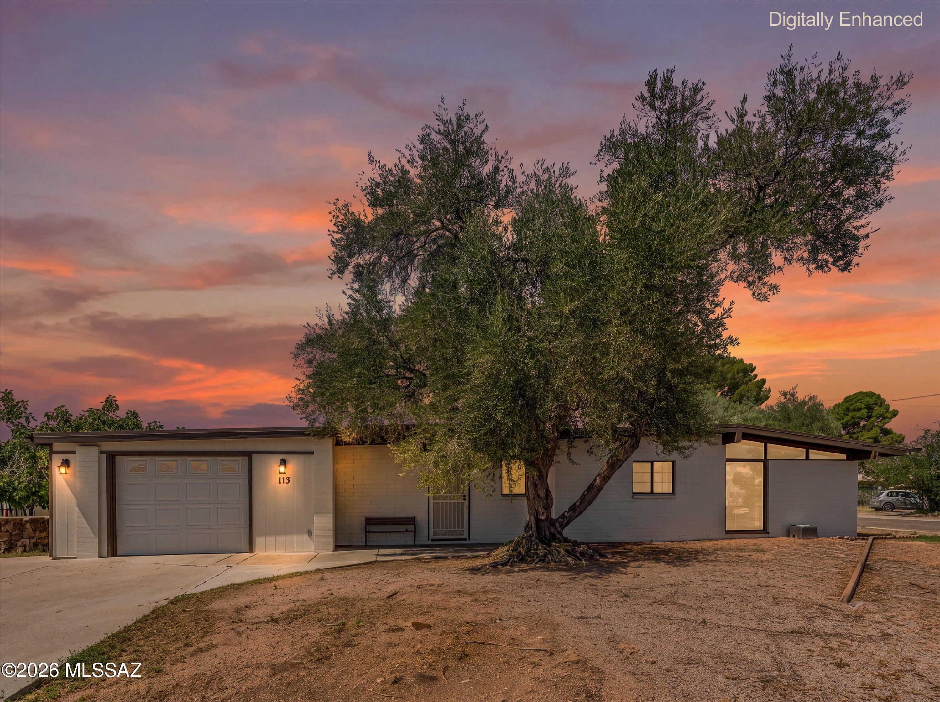 This home has room to breathe! Enjoy 2,259 square feet of living in this 3-bedroom, 2 bath home- a rare find in San Manuel! Nestled between stunning olive and fig trees that tell you this property has history and heart. 

Step inside and the ''wow'' moment happens immediately: a large addition creates a wide-open great room where the kitchen, dining, and living spaces flow together as one true heart of the home. Exposed wood beams, skylights, and a striking brick fireplace anchor the space with warmth, while multiple ceiling fans keep things comfortable through the desert seasons. The kitchen offers full tile counters, stainless appliances, and custom stained-glass cabinet accents that add unexpected charm to an already functional layout- perfect for the cook who still wants to be part of the conversation.

The primary bedroom is generously sized with an ensuite bath, offering a quiet retreat at the end of the day.

But it's the backyard where this property truly sets itself apart. Step out to your own private oasis, complete with a charming gazebo and mature shade trees - a resort-style escape. When the sun sets, don't miss the views of the Galiuro Mountains!

This is Rural Living the way it's meant to be -- spacious, private, and full of character!