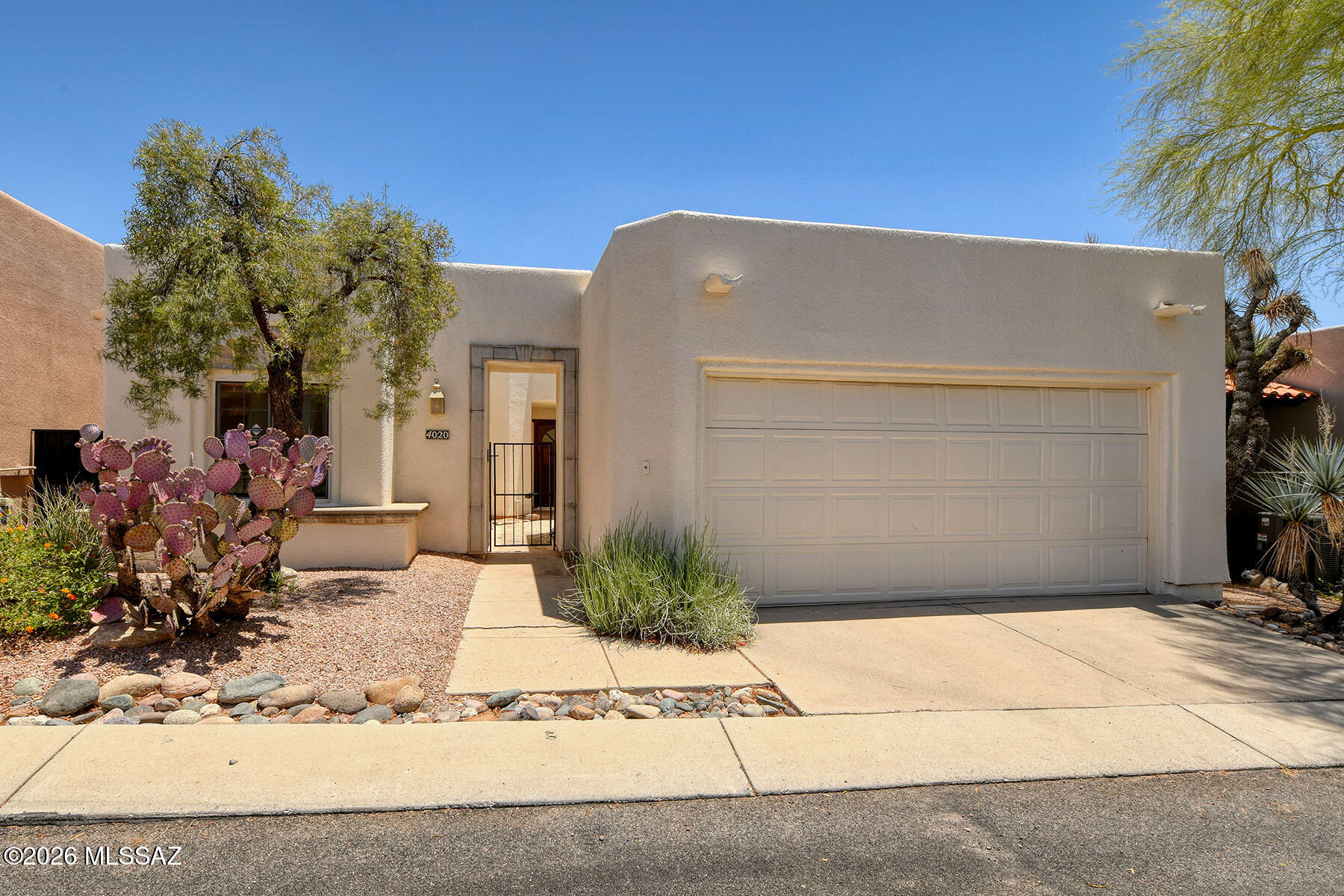 OPPORTUNITY KNOCKS! Attractively priced & ready for your personal touches. Located in the prestigious La Paloma community, this move-in ready home offers the ideal lock-&-leave lifestyle for winter visitors or a surprisingly spacious option for downsizing. The home features generously sized bedrooms, bathrooms and an open-concept living area. A well designed kitchen filled with natural light includes a private breakfast nook, the perfect setting to begin your day. Situated within the exclusive Ridge 4 enclave and surrounded by the fairways of La Paloma Country Club, this home is the definition of Catalina Foothills living. High ceilings, elegant Mediterranean architectural details, and walls of windows all help to create an expansive feel. Five sliding glass doors expand your living... space and help you to enjoy the Tucson lifestyle we are famous for.  Freshly painted interior and priced to sell!
