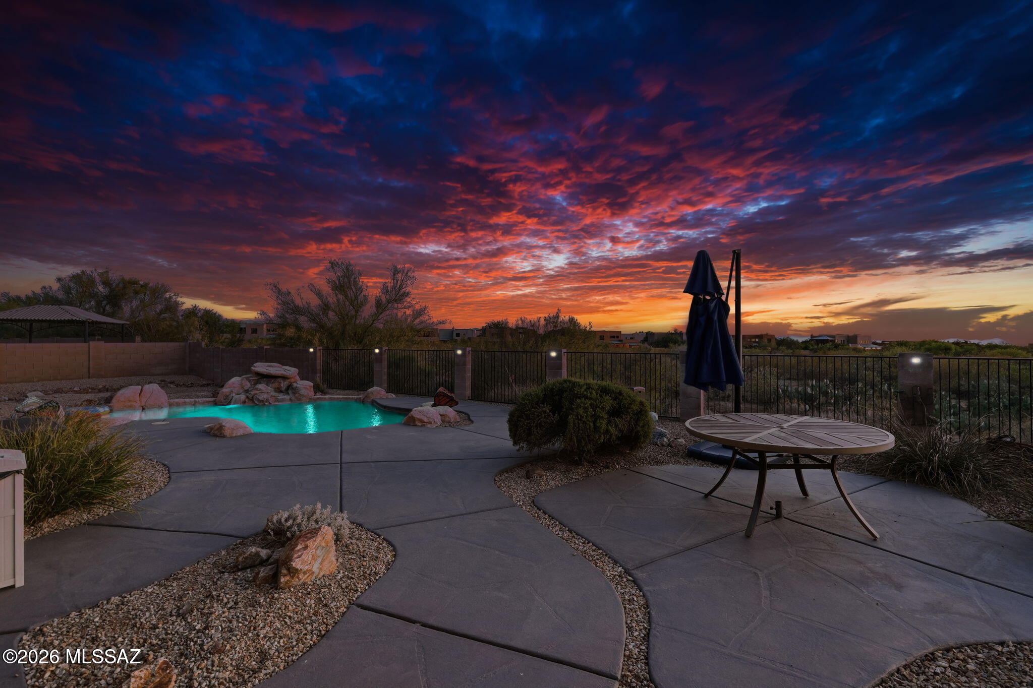 Thoughtfully updated and meticulously maintained, this Rincon Trails home in the Vail School District offers the features today's buyers are looking for both inside and out. The open floor plan includes custom tile flooring, fresh interior paint, custom pantry cabinetry, upgraded kitchen storage, under cabinet lighting, and rechargeable motorized blinds.

A standout feature is the owned solar system, with the current owners reporting no electric bill, adding long term value and energy efficiency. Recent improvements also include a new HVAC system, furnace, air handler, water heater, professionally recoated roof, and whole house water filtration and softener system.

Outdoor living is designed to be enjoyed year round with a refreshed pool, outdoor kitchen, covered patio with fireplace, mounted smart TV, low maintenance turf courtyard, and custom paver walkways that create inviting spaces for relaxing or gathering.

Additional highlights include custom garage cabinetry and storage, multiple smart TVs, prepaid pool service through December 2026, and transferable HVAC, termite, and turf warranties. Conveniently located near neighborhood parks, shopping, dining, and everyday amenities, this home reflects years of thoughtful care and offers a rare combination of modern updates, energy efficiency, functional living spaces, and outdoor amenities ready to enjoy from day one.

Schedule your private showing today!