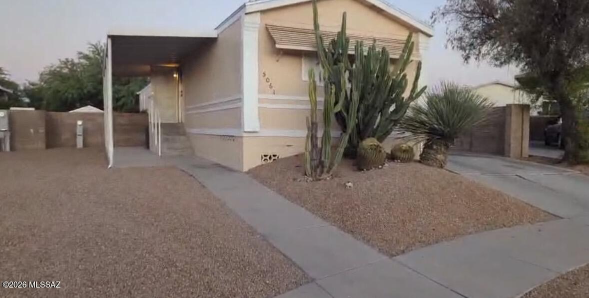 Charming 3 bed, 2 bath MSFR in sought-after Country Club Terrace HOA. Fully remodeled with new paint, fixtures, flooring, and carpet. No more polybutylene plumbing. New shingle roof by licensed contractor. Renovated master bed/bath with stunning shower. Split floor plan, serviced HVAC, and large cul-de-sac lot with walled backyard. Near U of A, Kino Sports, downtown, schools, shopping, and dining. Seller might consider a carryback with a substantial downpayment. FHA financing might not be applicable--check with your lender. Don't miss this beautifully updated Tucson home! **Owner/Agent disclosure required on all offers.**