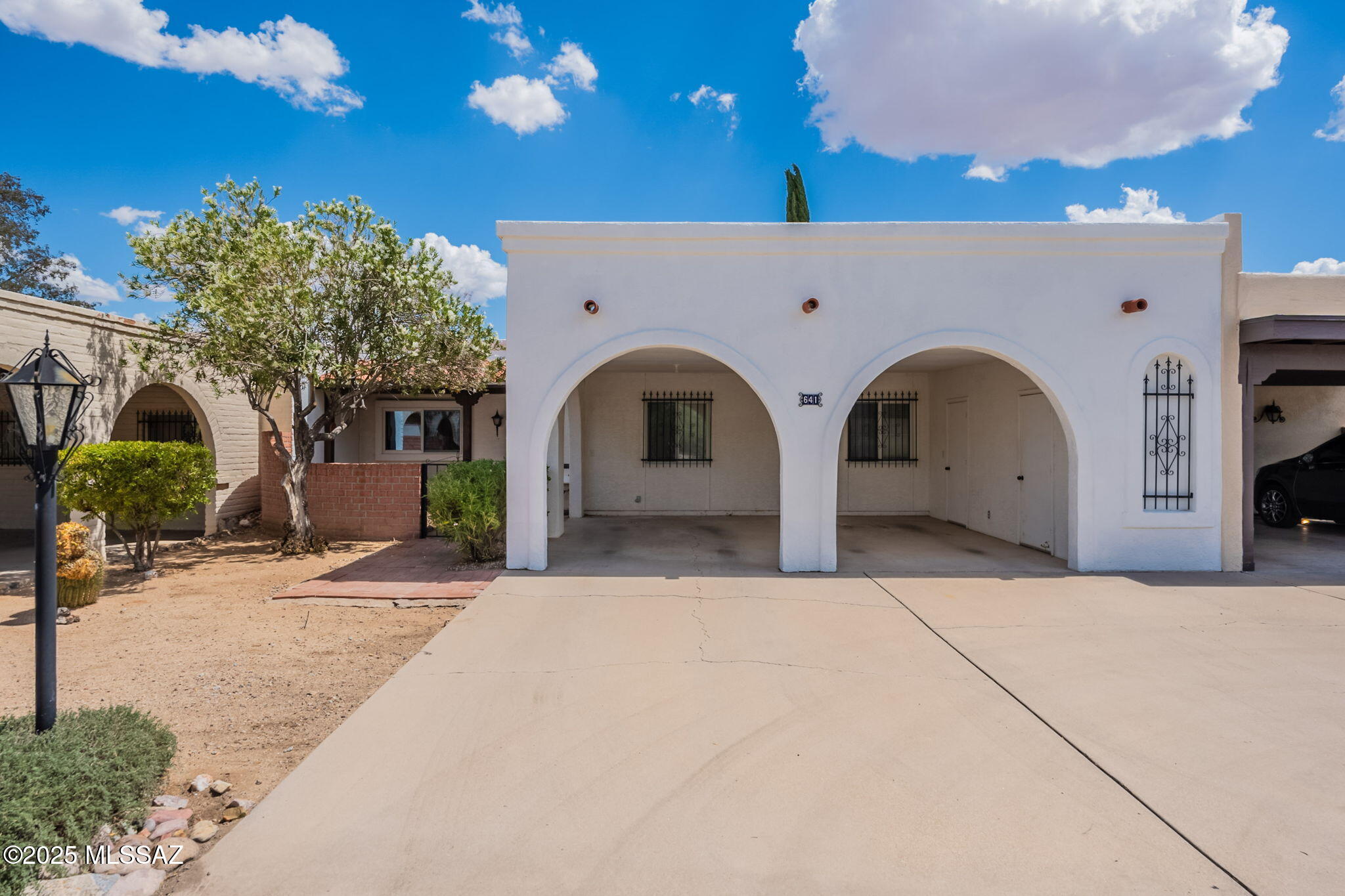 Set in a quiet Green Valley neighborhood, this home invites you to slow down and take in the beauty of the Santa Rita Mountains, where sunrises paint the sky and evenings settle into peaceful desert stillness. A welcoming courtyard leads you inside, where an open layout draws your eyes straight through the home to those breathtaking mountain views.

Inside, the home feels fresh, clean, and completely renewed with freshly painted interiors in a modern two-tone palette that brightens every space. New luxury plank vinyl flooring flows seamlessly throughout, offering both durability and a warm, cohesive look that ties the home together beautifully. Natural light pours in through newer windows and clerestory accents, enhancing the airy feel and highlighting the thoughtful updates. The kitchen has been refreshed with all-new Whirlpool appliances, including a newly added oven, creating a space that's both functional and inviting for everyday living and entertaining. The great room opens effortlessly to the backyard, perfect for relaxing, gathering, and enjoying the desert backdrop.

A brand-new roof adds peace of mind, while comfortable guest spaces, a versatile bonus room, and a serene primary suite with private backyard access complete the home. From quiet mornings to star-filled nights, this home offers an easy, elevated lifestyle framed by unforgettable mountain views.