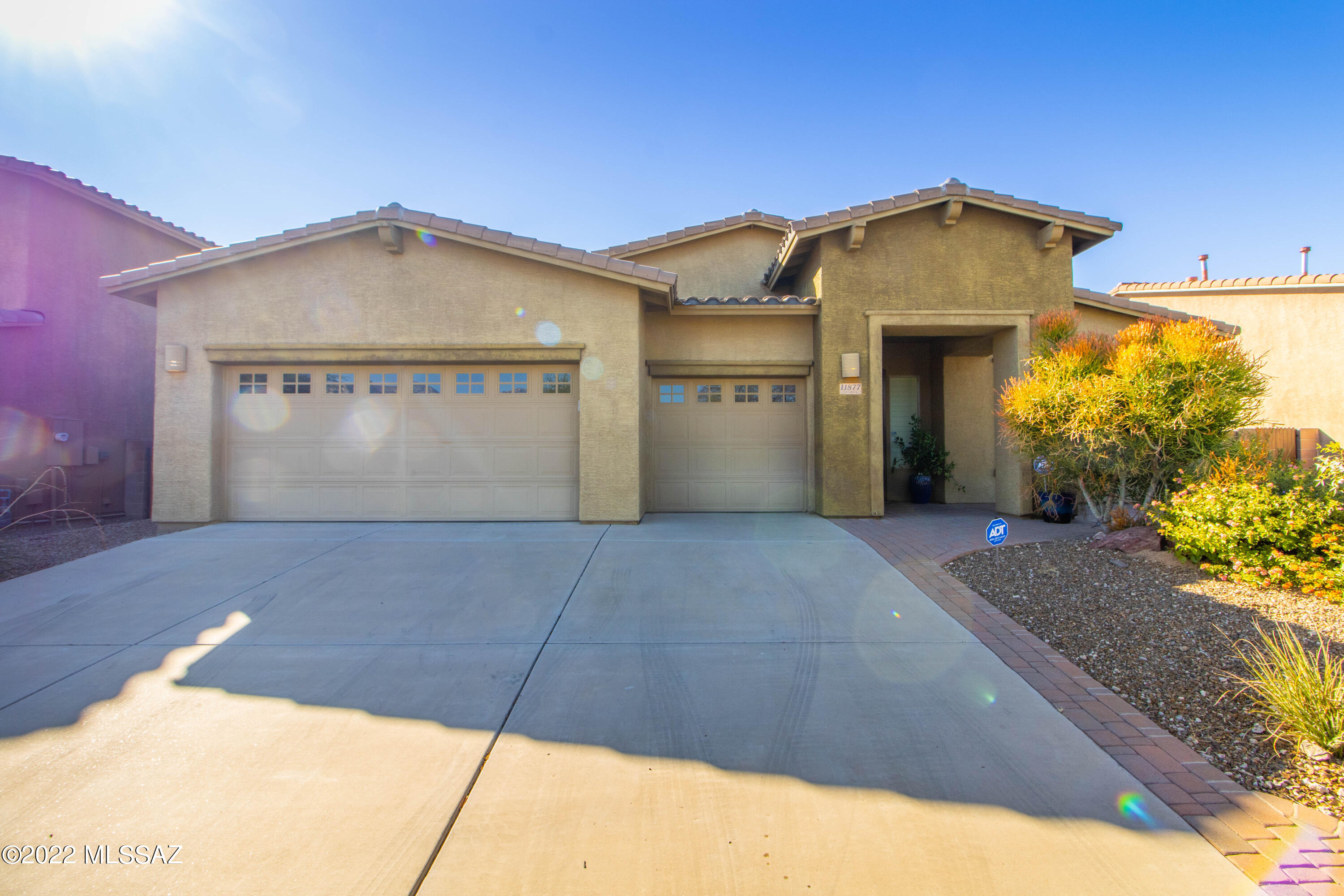 Beautiful & well-cared for home in Oro Valley! Featuring a spacious 2,810 sq.ft., 4beds/3 baths, elegant Living Room/Dining Room, huge Family Room w/custom fireplace & a 3.5 garage. BRAND NEW LUXURY VINYL PLANK FLOORING & WINDOW SHUTTERS THROUGHOUT! Open Kitchen w/large island, newer luxury stainless appliances incl. fridge, wall oven/micro & cooktop, & a lovely Dining area! The Primary Bedroom Suite boasts of expanded bay windows, huge walk-in closet, dual vanity, shower & soaking tub! The split floor plan creates privacy and space for all! Venture out back to find a private oasis with 7 mature fruit trees, grass & flagstone/pavers.