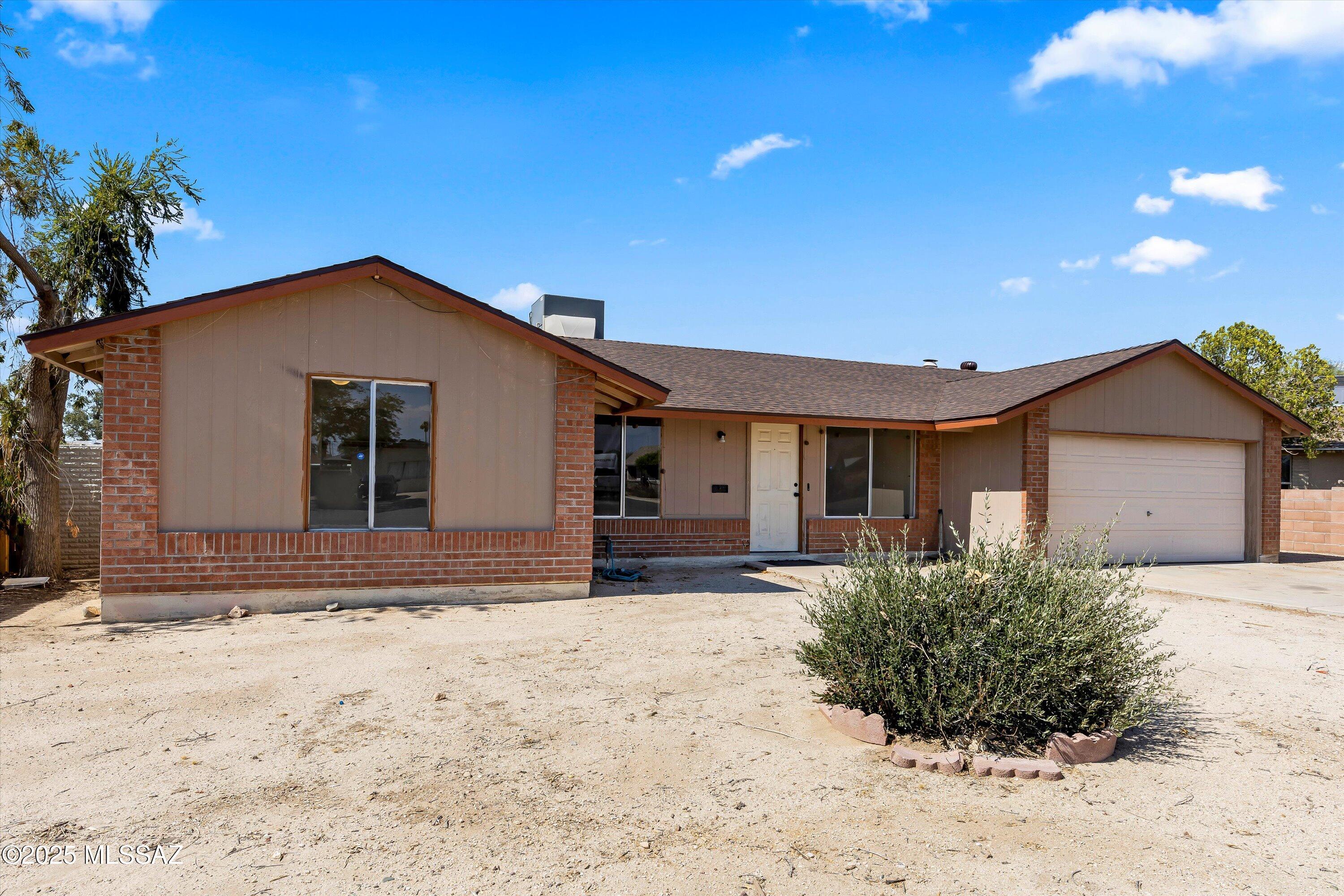 Charming ranch style home located in desirable Northwest Tucson community of Casas Del Oeste. This 4 BD/2BA/1,900 Sq. Ft (per owner) home offers a family room w/fireplace, dining area & bonus room. Cozy kitchen has white appliances, plenty of counter space, island & pantry closet. NEW Roof 2025 & Newer AC 2022. Primary suite is spacious w/shower. Fully fenced backyard is open for your ideas w/plenty of room & a covered patio. Convenient location to I-10, restaurants, shopping, schools & much more.