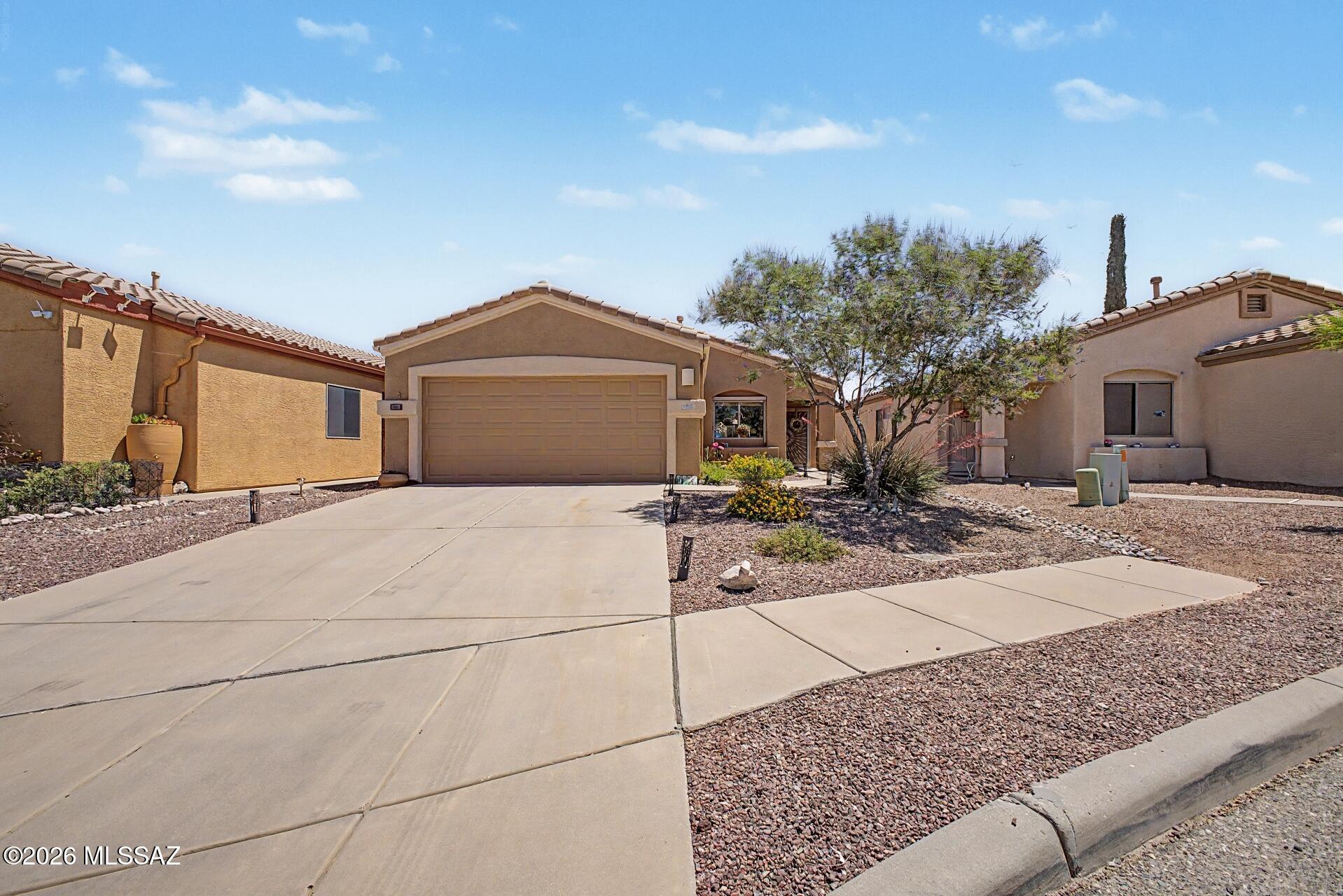 List Range Pricing. Seller will accept or counter offers between $294,400 - 307,400. Tucked away on a quiet cul-de-sac, this beautifully maintained 3 bed, 2 bath home offers privacy with no rear neighbors and a peaceful front common area. Original owner has taken exceptional care of the property, featuring a newer AC, gas stove, and stainless steel appliances. Enjoy a full-length covered rear porch with spa, rolling shades, and solar screens--perfect for relaxing or entertaining. The garage includes built-in cabinets for added storage. Not many homes come up for sale in this community--don't miss this rare find combining comfort, functionality, and pride of ownership!