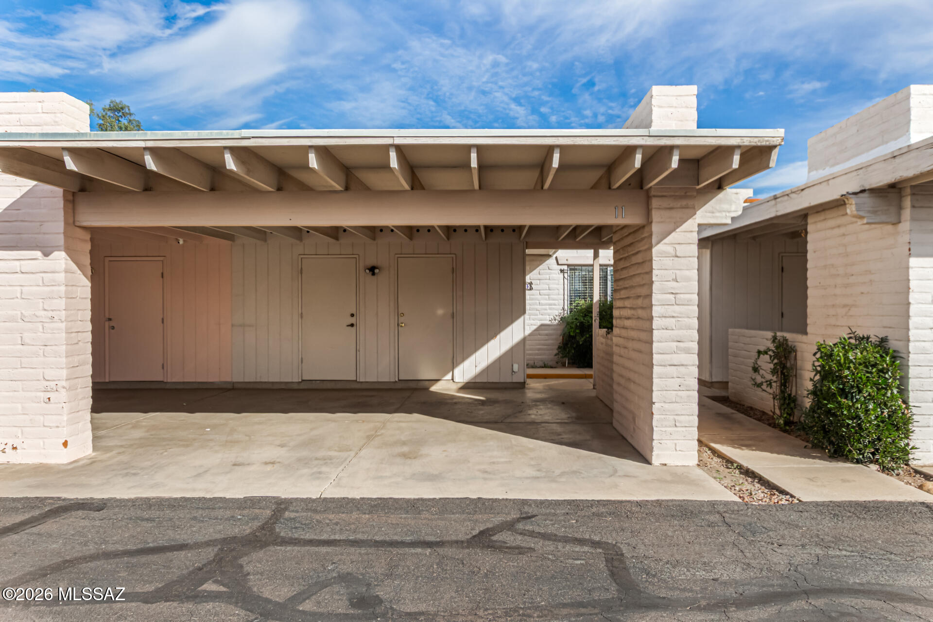 This beautifully updated townhome is ideally located near Tucson Mall, restaurants, and shopping. The interior features fresh paint and brand-new carpeting, offering a clean, welcoming space that is move-in ready. A new HVAC system and refrigerator (both approximately one year old) provide added comfort and efficiency.

The functional floor plan includes two spacious bedrooms and well-appointed bathrooms with modern cabinetry, updated sinks, contemporary hardware, and a unique chalkboard accent wall for added character.

The kitchen offers maple cabinetry and comes equipped with all essential appliances. An eat-in dining area provides a comfortable space for everyday meals. A versatile bonus room adds flexibility, perfect for a home office, hobby space, or additional living area. Enjoy outdoor living with easy access to a covered patio, ideal for relaxing year-round. Additional features include a utility closet, two-car carport, extra storage, and close proximity to the community pool, just steps away.

Pets considered with owner approval. Breed, size, and number restrictions may apply.