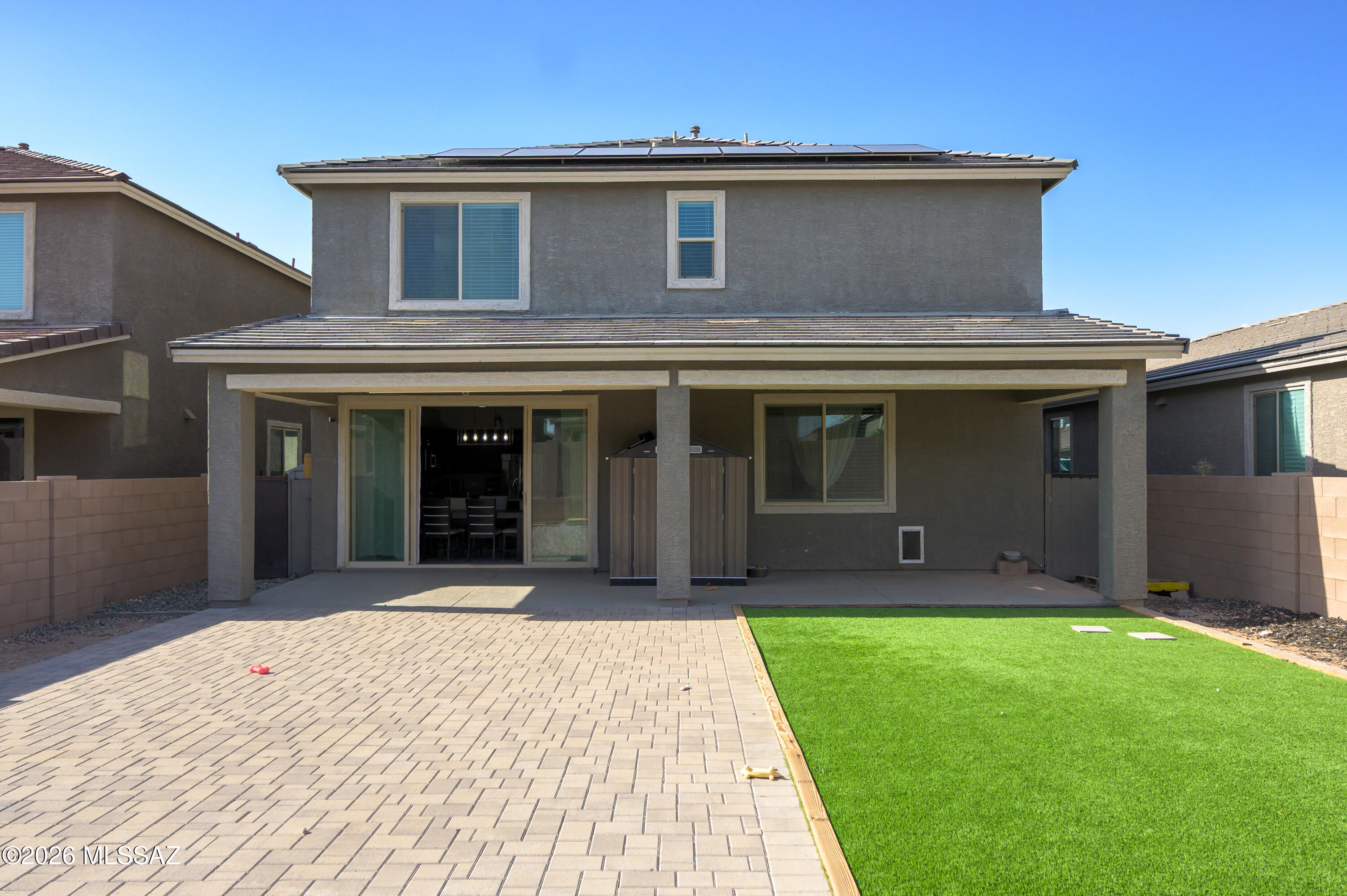 This gorgeous Moonstone home boasts a stylish two-story design with four bedrooms, three bathrooms, and a versatile bonus room that could serve as a fifth bedroom. Combining comfort with modern flair, it offers a fully landscaped backyard featuring artificial turf, pavers, and a wide covered patio perfect for entertaining. With over $50,000 in upgrades, the kitchen impresses with premium finishes, stainless steel appliances, granite countertops, and a spacious island, complemented by upgraded floors and extra windows. Upstairs bedrooms feature large walk-in closets, a large loft with mountain views, and an oversized laundry room with a washer and dryer (Included). Additional perks include a security system/Cameras. Water RO system/Alkaline. Newer 10-kilowatt solar PV system installed.
