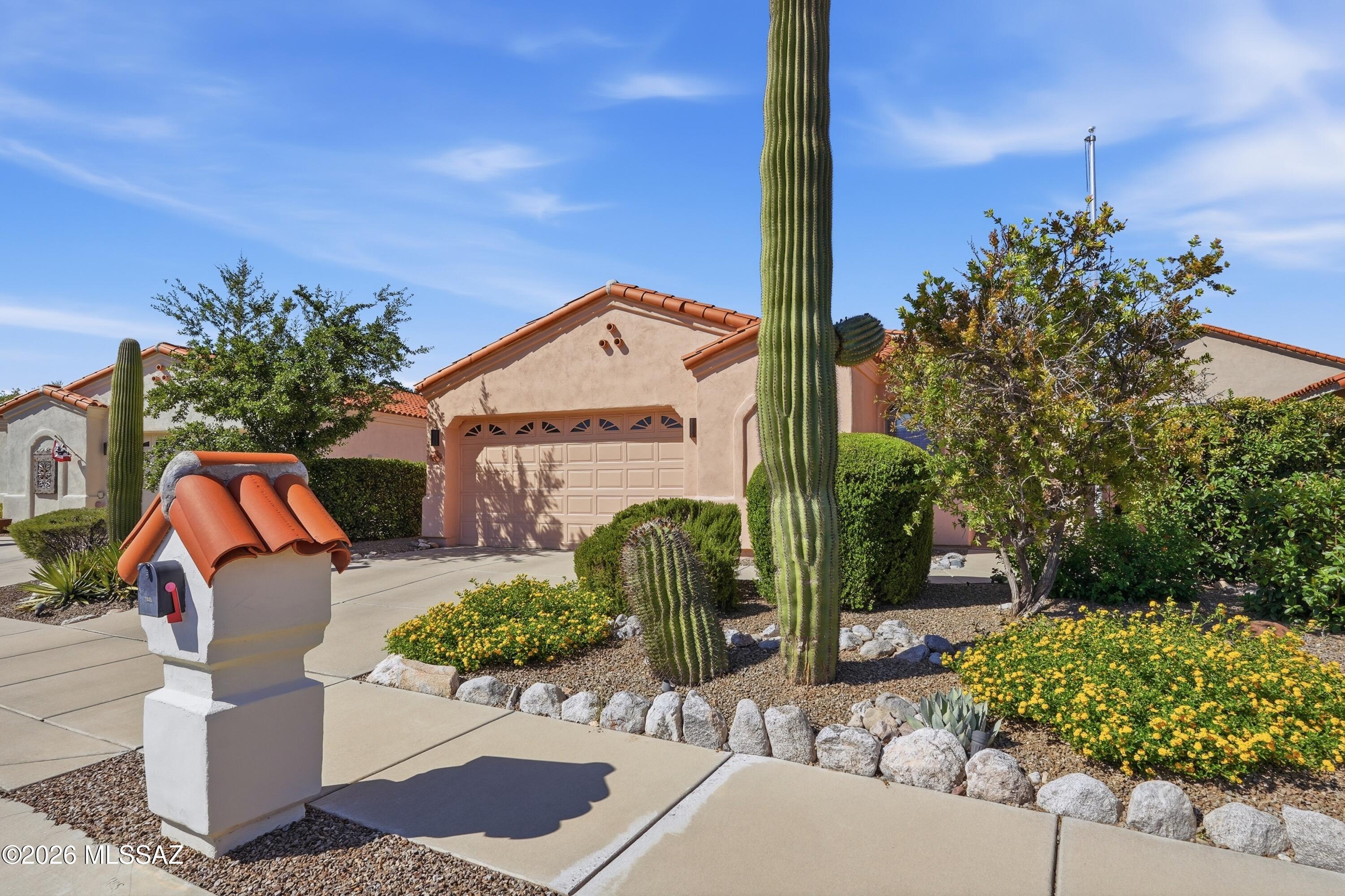 Beautifully updated and meticulously maintained, this move-in ready hjome is among the finest in Vactor Ranch! The thoughtfully designed split-bedroom floorplan offers spacious living areas, abundant natural light, and exceptional functionality. The upgraded kitchen opens seamlessly to the great room, creating the perfect space for everyday living and entertaining. Pride of ownership is evident throughout with tasteful finishes and attention to detail in every room. Enjoy low-maintenance living in this desirable gated community, conveniently located near shopping, dining, parks, and Tucson's eastside amenities. A rare opportunity to own one of the most updated homes in the neighborhood!