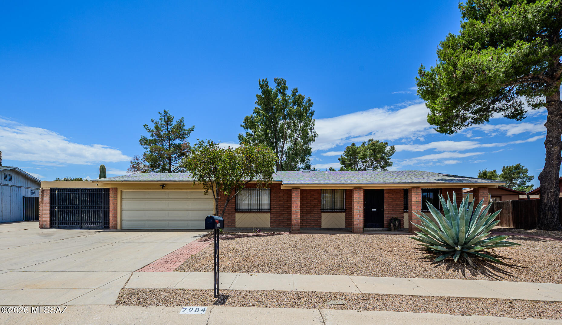 Enjoy easy Tucson living at 7984 E Boojum St, a 3-bed, 2-bath home with 1,361 sq ft in Tucson, Pima County. The spacious lot offers a backyard pool, artificial grass, and a storage shed for added convenience.  Inside, central AC, ceiling fans, kitchen appliances, washer, and dryer help make daily living simple.  Parking and project space are a plus with a 2-car garage, additional car space, and workshop.  Close to Lincoln Regional Park, Clements Recreation Center, Fantasy Island bike trails, Pima Air & Space Museum, Davis-Monthan AFB, Raytheon, shopping, dining, and schools.