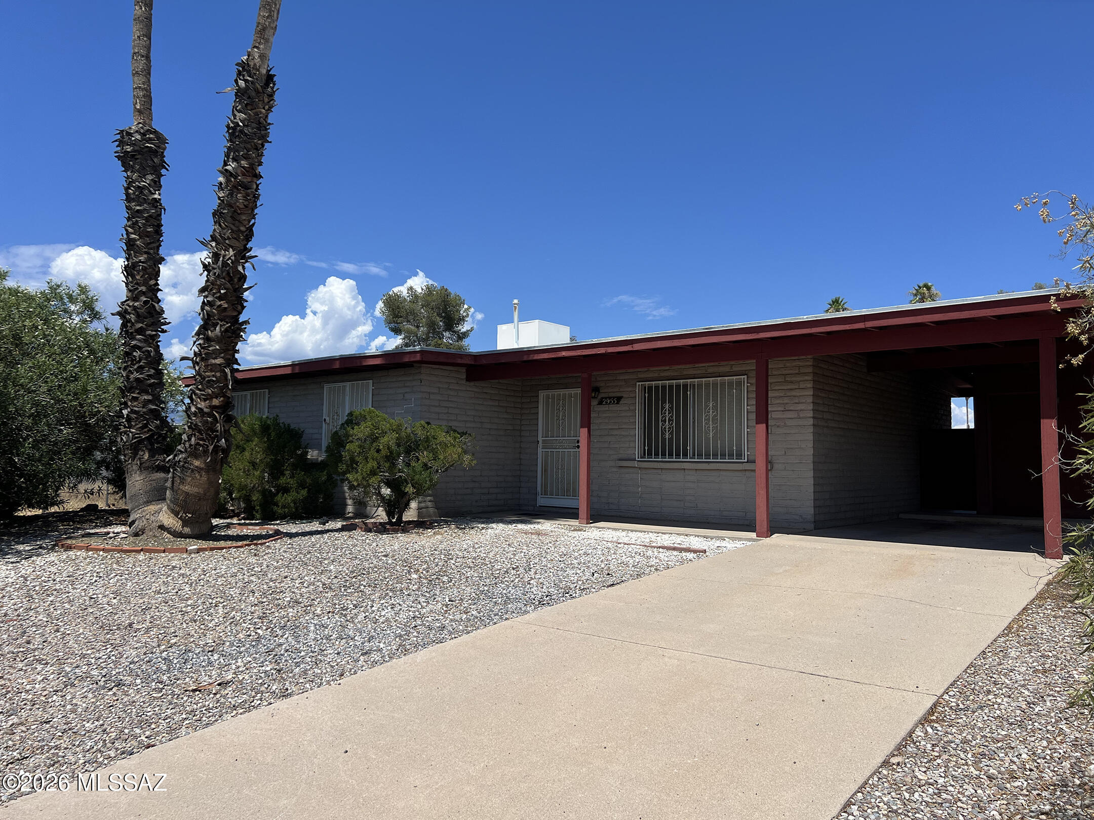 Charming, vintage, well-maintained 3 bedroom, 2 bathroom house sits back off the street on a Cul-de-sac.  Conveniently located near Davis Monthan Air Force Base, schools, transportation, shopping and restaurants.  Large, enclosed backyard. No HOA. No Carpet. Extra storage space available in carport.  A true gem in the heart of Tucson.  A must see!