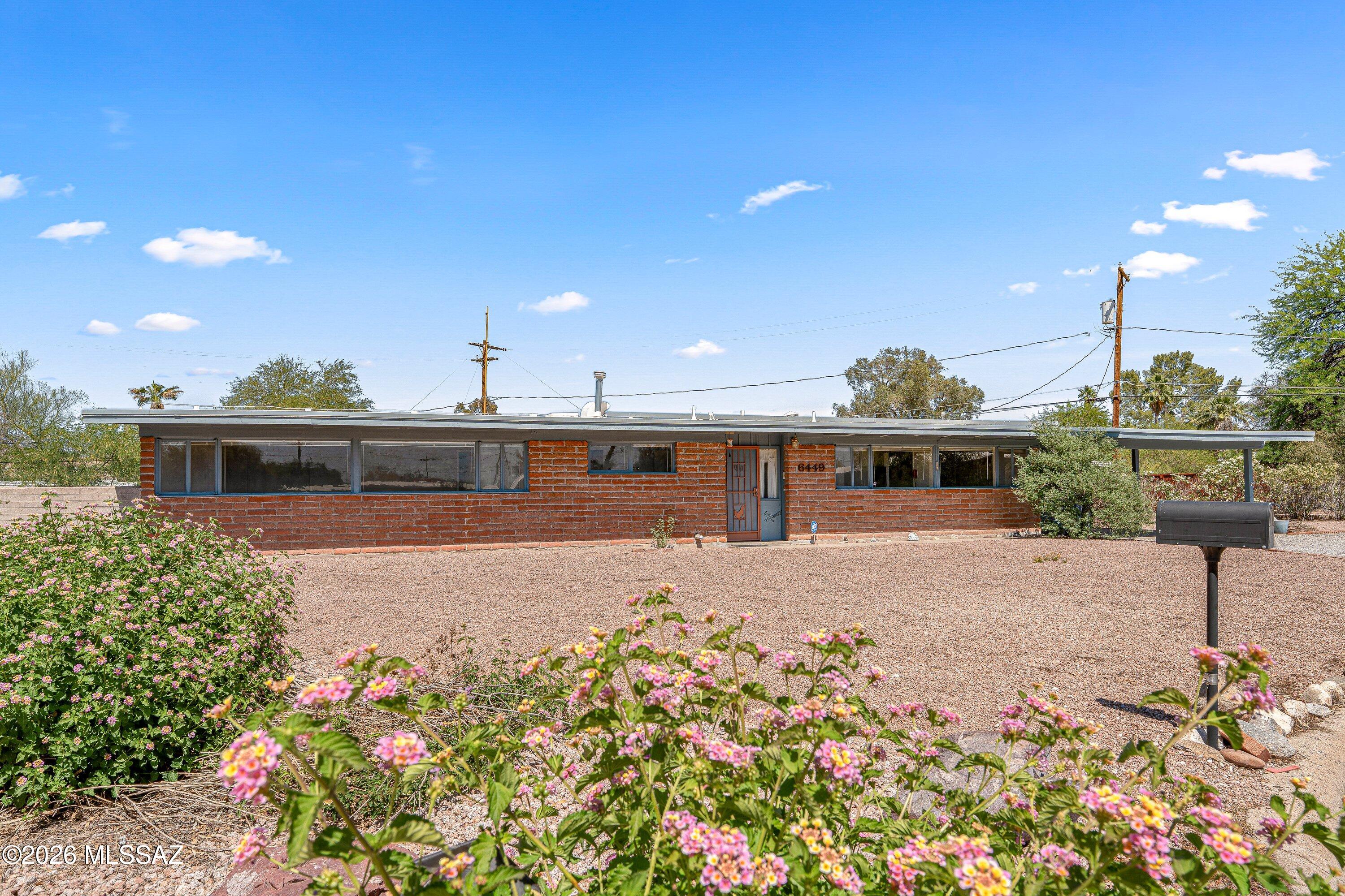Located in the historic San Rafael neighborhood, this 1955 mid-century modern home sits on a desirable corner lot in the Cul-de-sac and is super cute with plenty of charm. The home has a warm, inviting feel and has been well cared for over the years. Inside, you'll find a comfortable layout with great natural light that highlights its mid-century modern character. The large backyard offers plenty of space and flexibility, along with a patio for easy outdoor living. Conveniently located near Park Place, restaurants, and everyday amenities.
