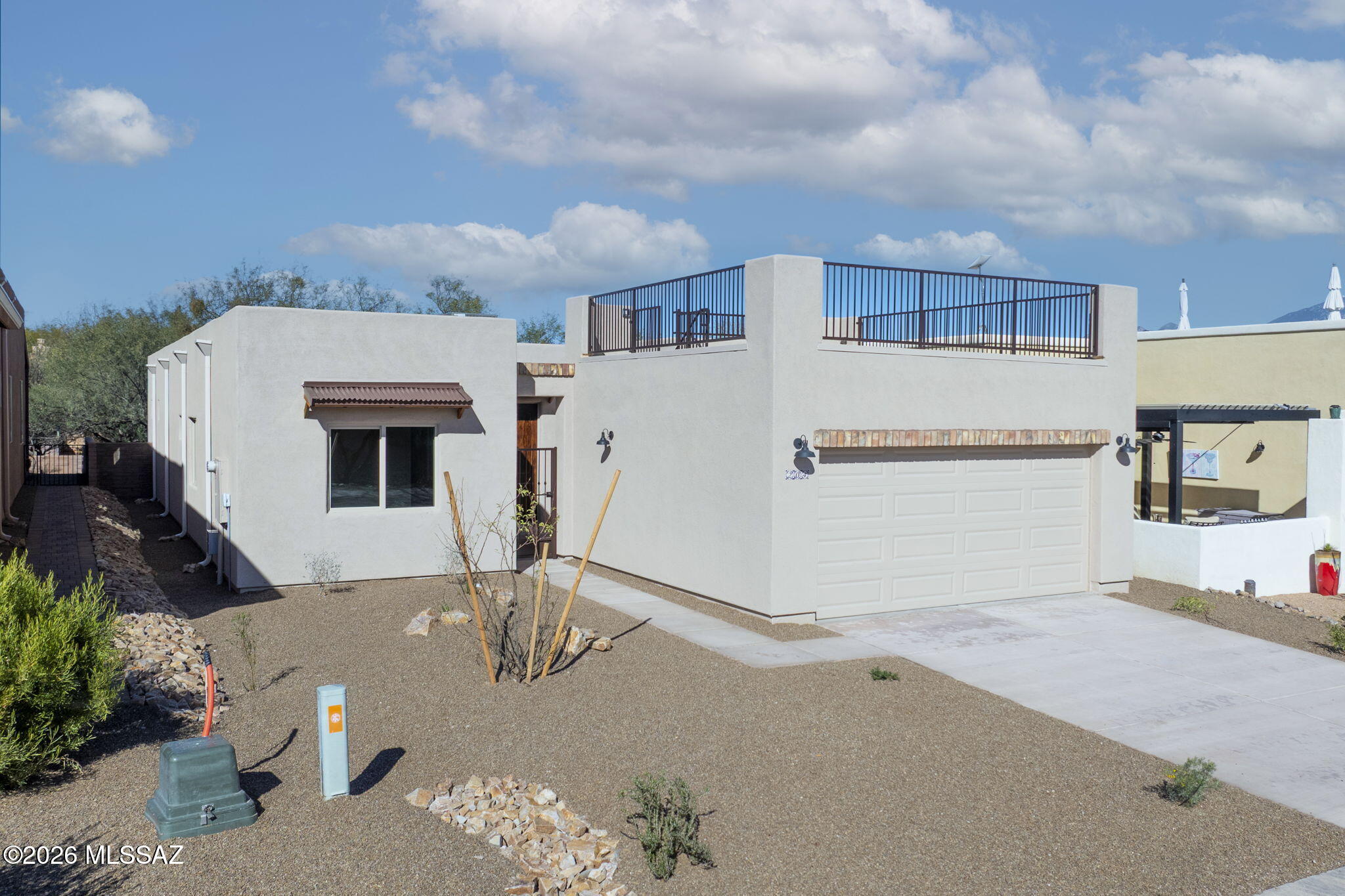 Experience elevated living in this brand-new, move-in-ready home. Featuring 2 bedrooms, 2 bathrooms, with a gas fireplace for cozy evenings and a flexible den. The design is centered on modern comfort with ''Tubac's unique charm''. The true centerpiece is the incredible sky deck, providing breathtaking 360-degree views of the Santa Rita and Tumacácori Mountains. Located moments from The Barrio de Tubac Park, the Juan Bautista de Anza National Historic trail, birdwatching, the village of Tubac and the renowned Tubac Golf Resort. This stunning home is where convenience and comfort meets spectacular scenery.Gary P. Brasher and Tracey Brasher are licensed Real Estate agents in the state of AZ with RLSIR acting as both the seller's representative and are principals of the selling entity.