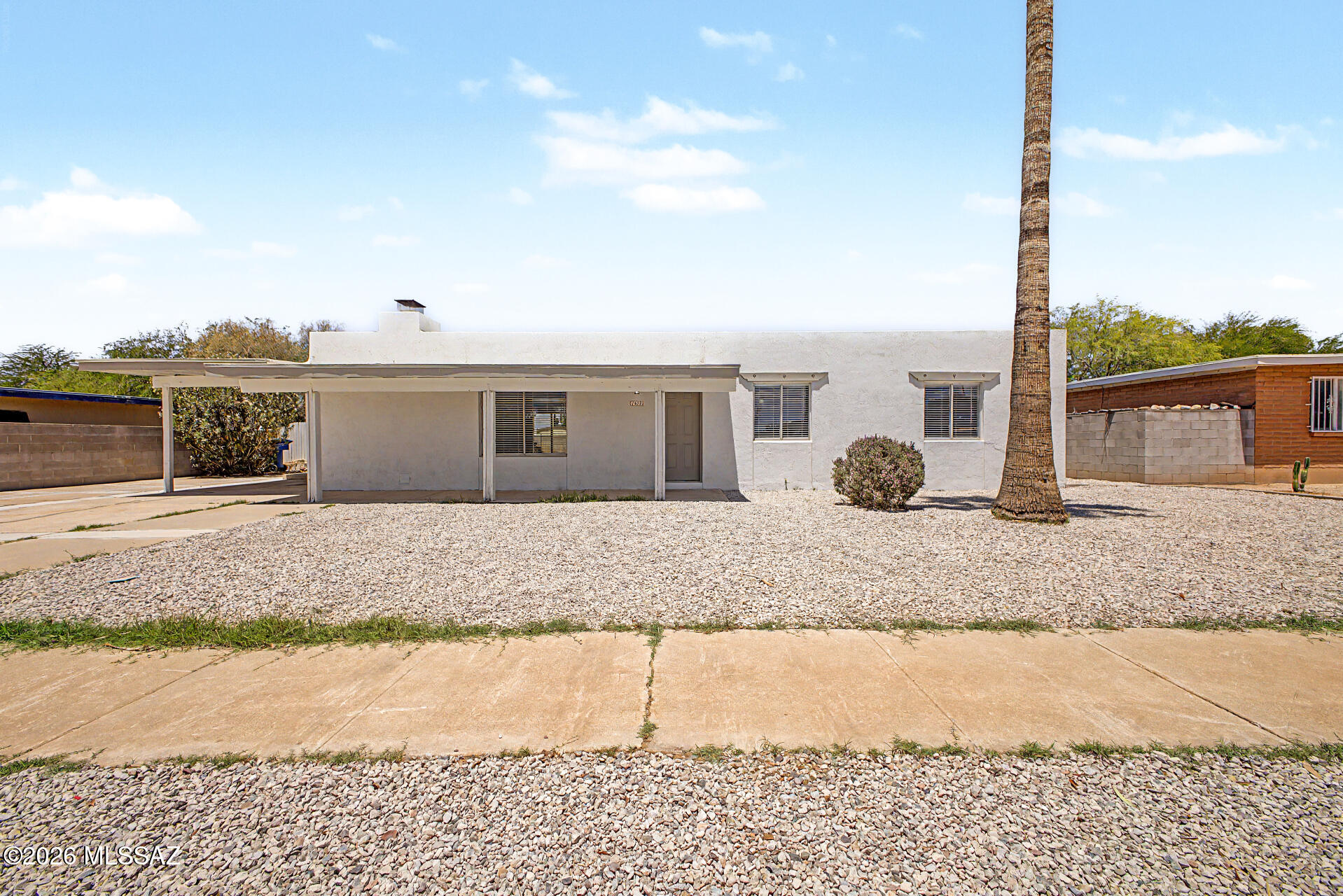 Opportunity, space, and location come together in this 4-bed, 2-bath home on an expansive 8,363 sq ft lot with NO HOA! Whether you're dreaming of adding a pool, creating a lush garden, expanding the home, or designing the outdoor retreat you've always wanted, this property offers endless possibilities and room to grow. Inside, enjoy a warm and inviting living room centered around a wood-burning fireplace with beautiful brick accents. The spacious kitchen features abundant cabinetry, a pantry, and plenty of storage to keep everything organized. Smooth tile flooring adds both style and easy maintenance. Nestled in a desirable neighborhood with convenient access to schools, parks, dining, shopping, and more, this home delivers the space, comfort, and value you deserve.