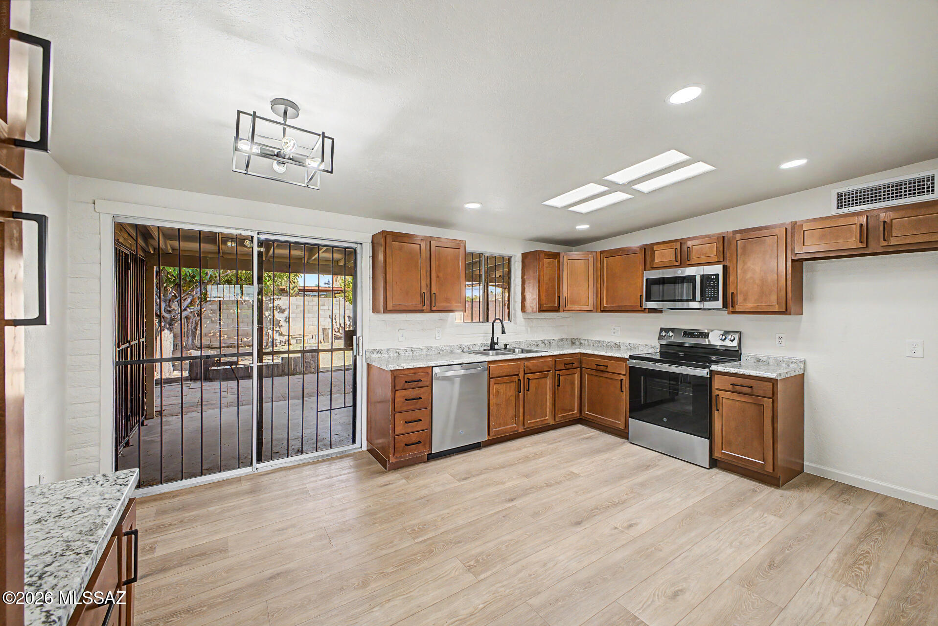 Seller will counter or accept offers between $279,000 and $299,000. New Listing Alert! Move-in ready ranch style single-family home featuring stainless steel appliances, luxury plank flooring, modern electrical and plumbing fixtures, fresh interior paint, and plush new carpet in bedrooms. Bathrooms updated including new vanities and chic tile shower surrounds.  Extended covered patio and extra storage outback.  A must see!