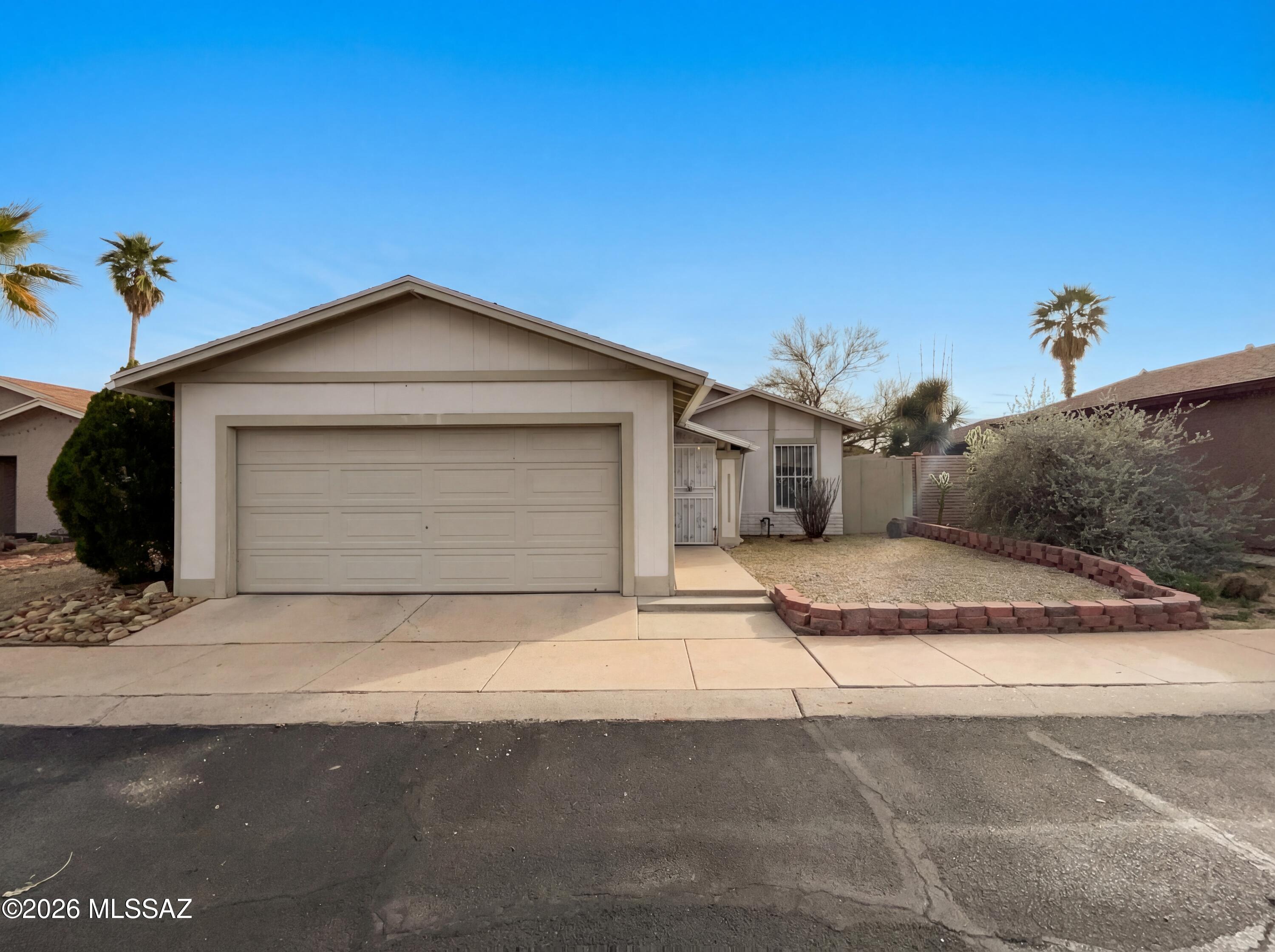 Great Starter Home-contemporary Feels very open Kitchen To Family Room.Ceramic Tile Floors,no Carpet! Lots Of Ceiling Fans, extra room off kitchen as well. Kitchen Has plenty Of cabinets, Pantry. Master W/Walk In Closet & Bath W/Dual Vanity Sinks. Nice Wrap Around Yd. W/Covered Patio, Mtn View, Block Wall & Assorted Trees. Paid off Solar with no bill from TEP! Home warranty offered with
Huge savings and a great location!