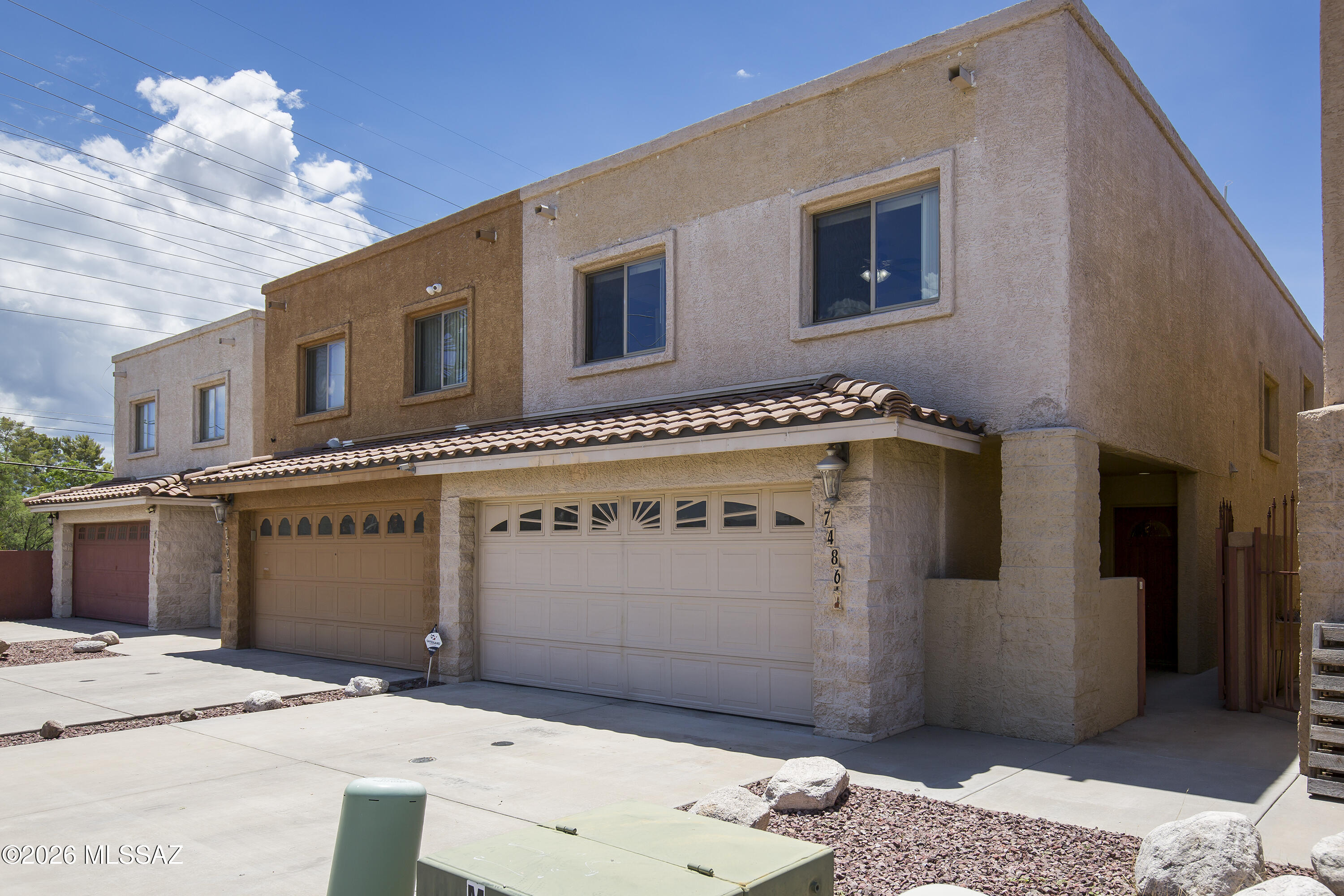 NO HOA! Rare opportunity to own a spacious 1,895 sq. ft. East Tucson townhome with the freedom and flexibility that comes without monthly HOA dues. 
This well-designed home features 3 bedrooms, 2.5 bathrooms, an attached 2-car garage, and generous living spaces throughout. Relax by the charming brick fireplace or entertain in the updated kitchen featuring granite countertops. The spacious primary suite offers ample closet space and an updated ensuite bathroom with dual sinks and a large walk-in shower. Two additional bedrooms provide plenty of room for family, guests, or a home office.
Step outside to your private enclosed patio, ideal for morning coffee, outdoor dining, or simply enjoying Tucson's beautiful weather.