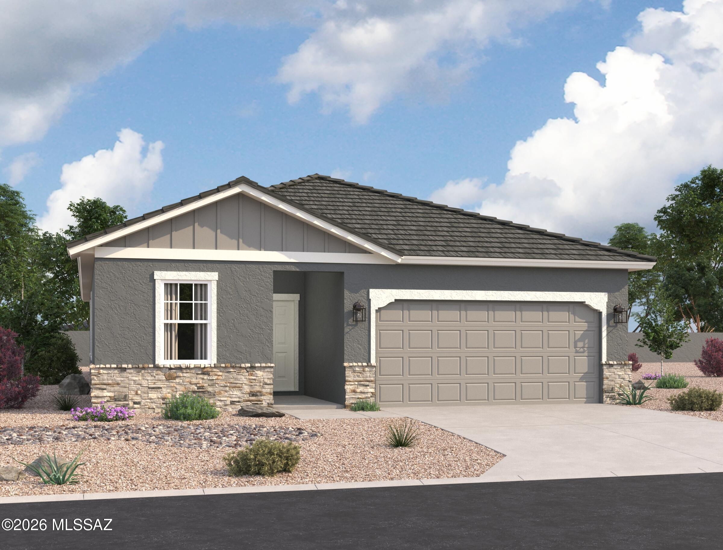 Our best-selling Prism plan sits right across from the park area with great views and beautiful sunsets!  4 Bedrooms and 3 Baths make this home a charmer!  Large island in the kitchen and a Jack-and-Jill 3rd bathroom too!  Beautiful, brand-new homes featuring thoughtfully designed floorplans in the scenic Tucson community of Star Valley! Conveniently located with easy access to I-19 and major Tucson destinations, this community offers the perfect balance of comfort, convenience, and outdoor living. Homes showcase desirable upgrades including 9' ceilings, white shaker cabinets, Shaw 17'' x 17'' tile flooring, and granite kitchen countertops. Each home comes move-in ready with stainless steel kitchen appliances, including a refrigerator, washer, and dryer. Energy-efficient features include Low-E dual-pane windows and a Wi-Fi programmable thermostat to help maximize comfort and savings. Exterior highlights include front yard desert landscaping with irrigation, covered patios, and spacious backyards designed for enjoying Tucson's beautiful sunsets. Residents enjoy community amenities including large park with soccer fields; walking paths and natural trails; children's play area; basketball courts; tennis courts; pickleball courts; natural-area dog park and incredible mountain views everywhere! This welcoming community offers the perfect combination of modern living and the natural beauty of the Tucson desert.